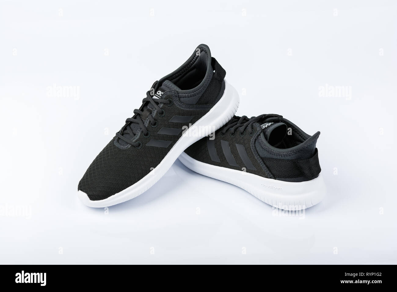 BURGAS, - MARCH 8, 2019: Adidas Women's Essentials Cloudfoam QT Flex Shoes Black white background Stock Photo - Alamy