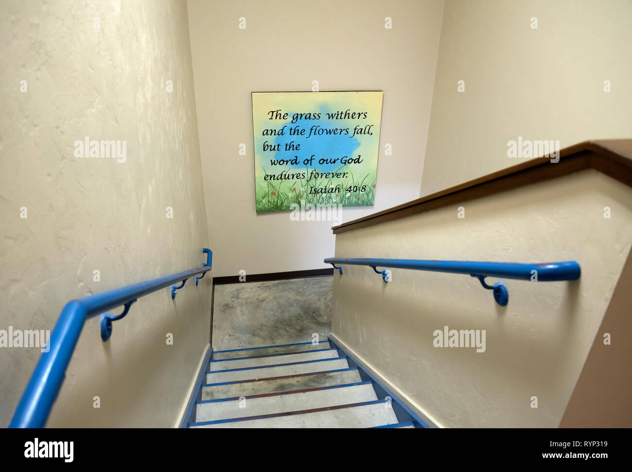 Church stairwell with a Bible verse from the Old Testament book of Isaiah  posted on wall. Stock Photo