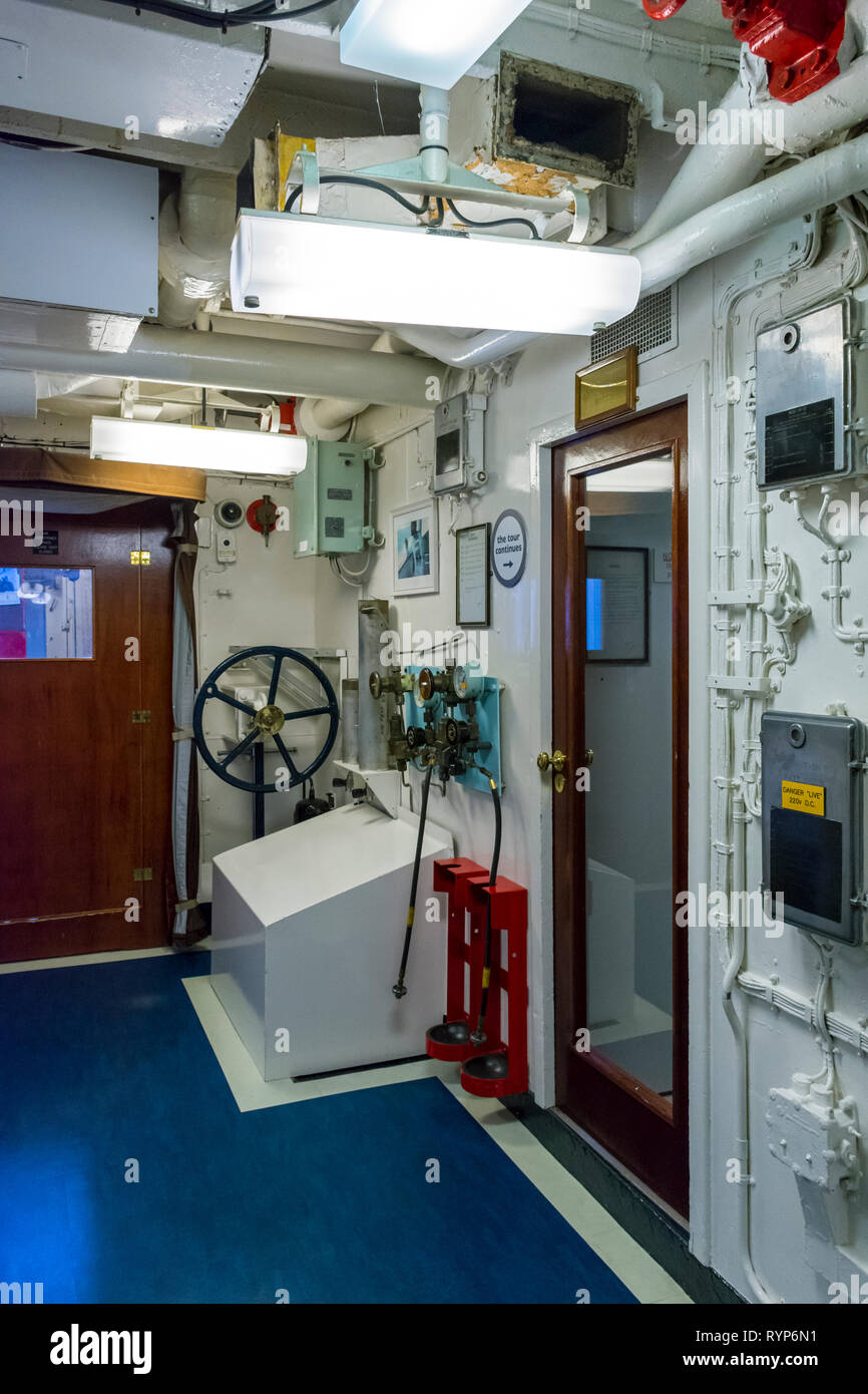 Equipment filled passageway in the lower decks of the Royal Yacht Britannia, Port of Leith, Edinburgh, Scotland, UK Stock Photo