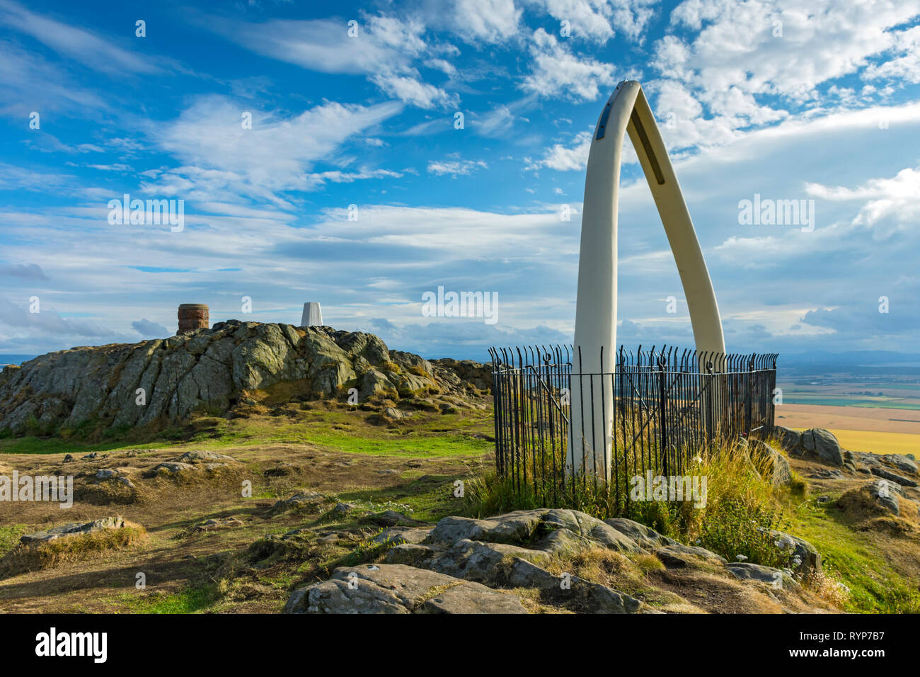 The  toposcope (viewpoint indicator), trig point and replica whale bones on the summit of North Berwick Law, East Lothian, Scotland, UK Stock Photo
