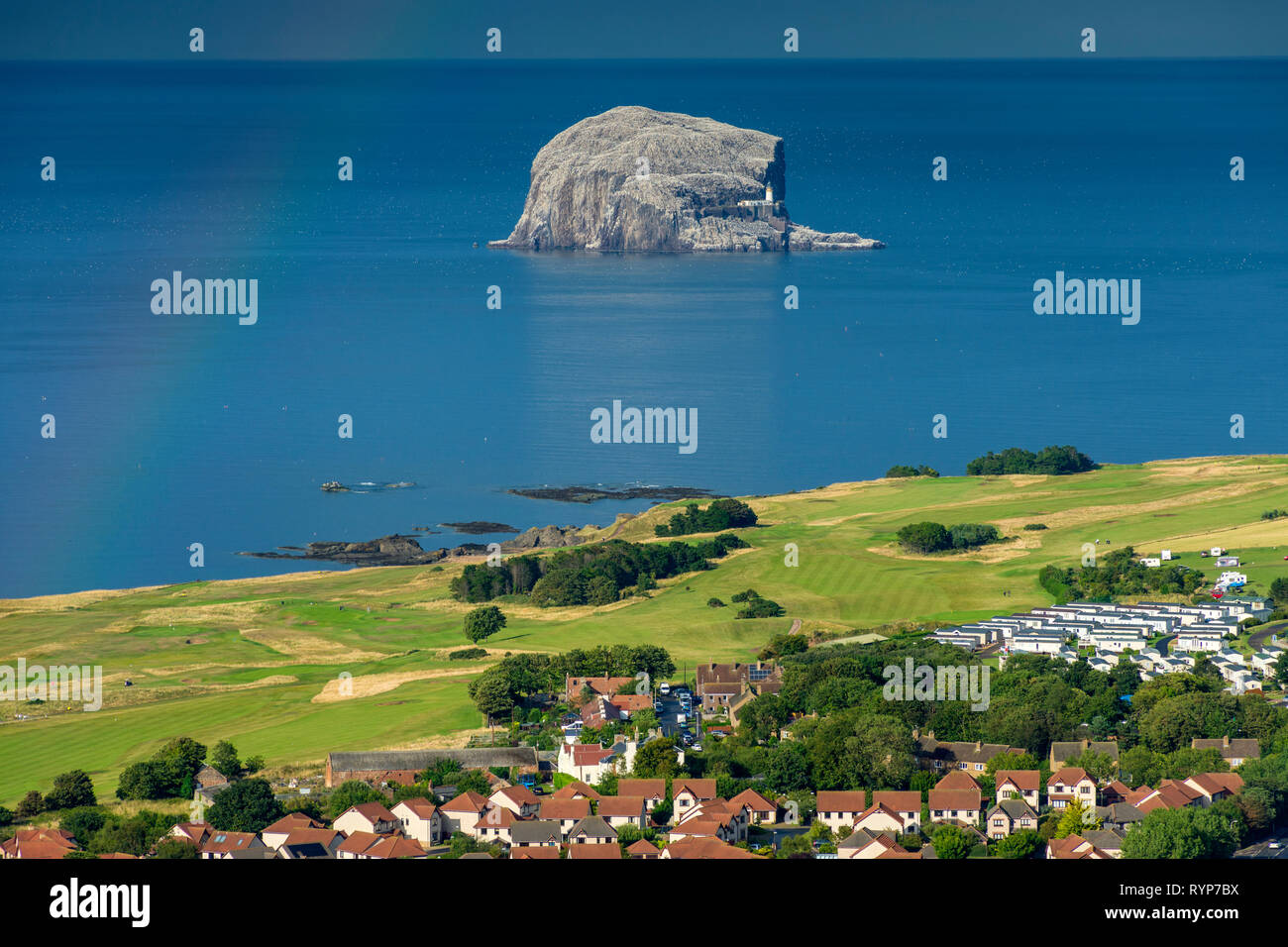 The Bass Rock and the eastern end of the town of North Berwick, from the summit of North Berwick Law, East Lothian, Scotland, UK Stock Photo
