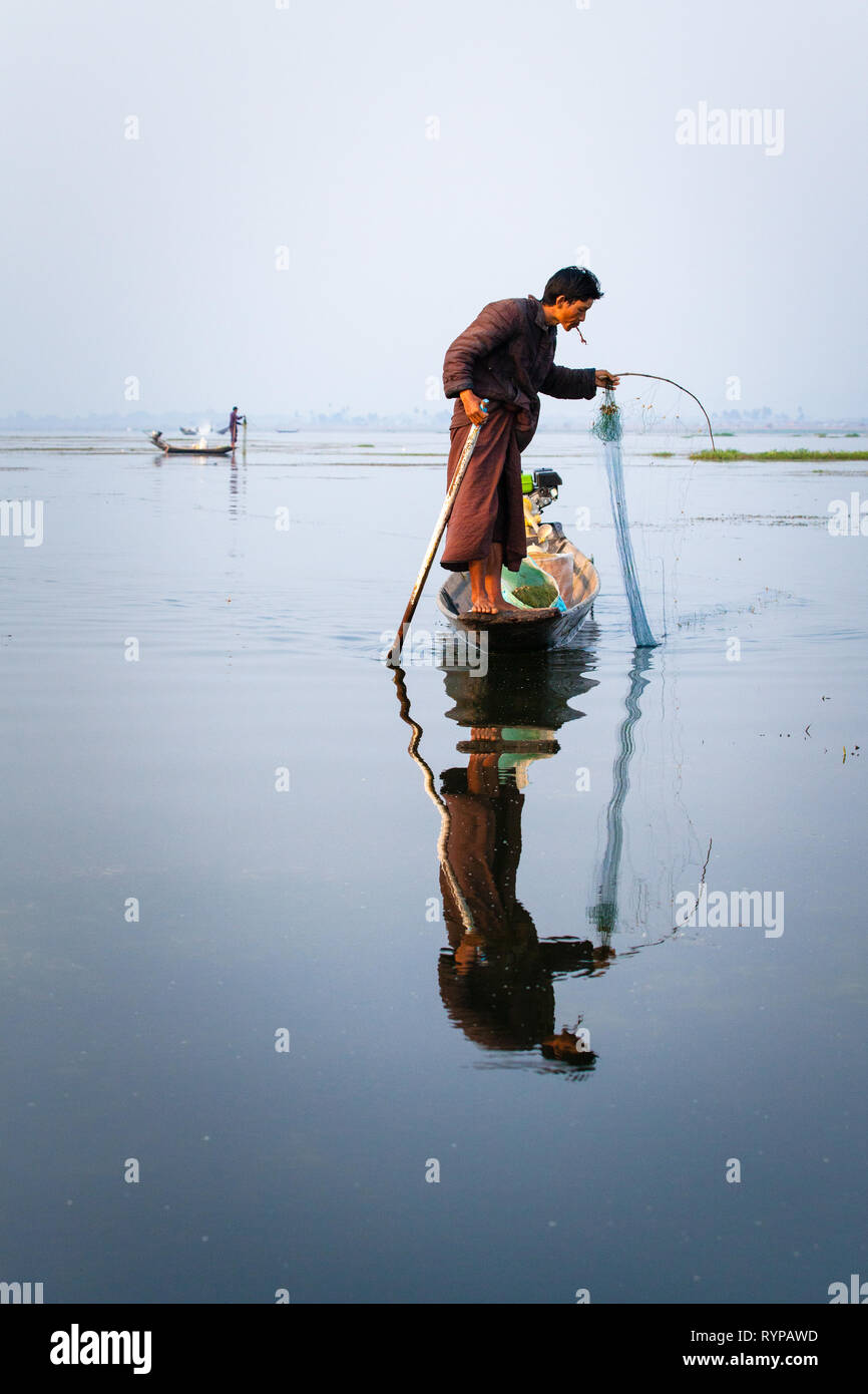 The famous leg-rowing fishermen of Inle Lake, Myanmar Stock Photo