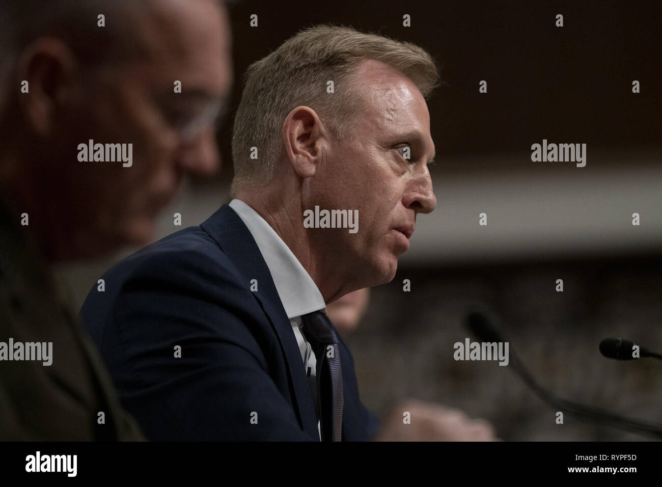 Washington, District of Columbia, USA. 14th Mar, 2019. PATRICK M. SHANAHAN, Acting Secretary Of Defense, testify before the Senate Armed Services Committee Hearing: Department of Defense Budget Posture. General JOSEPH F. DUNFORD, Jr., USMC, Chairman of The Joint Chiefs of Staff, is in the foreground. Credit: Douglas Christian/ZUMA Wire/Alamy Live News Stock Photo
