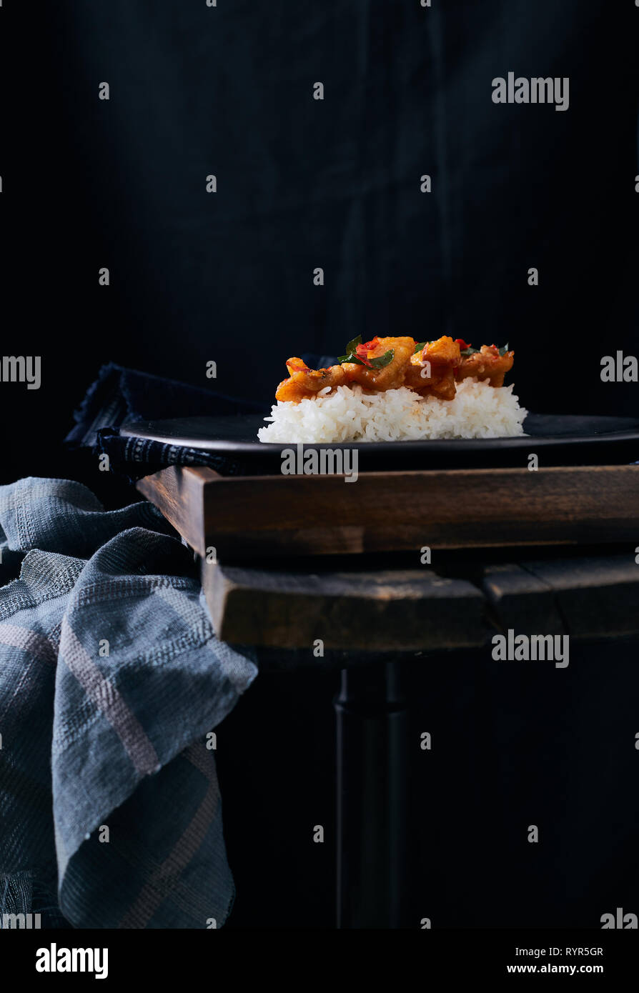 Stir fried chilli fish with rice Stock Photo - Alamy
