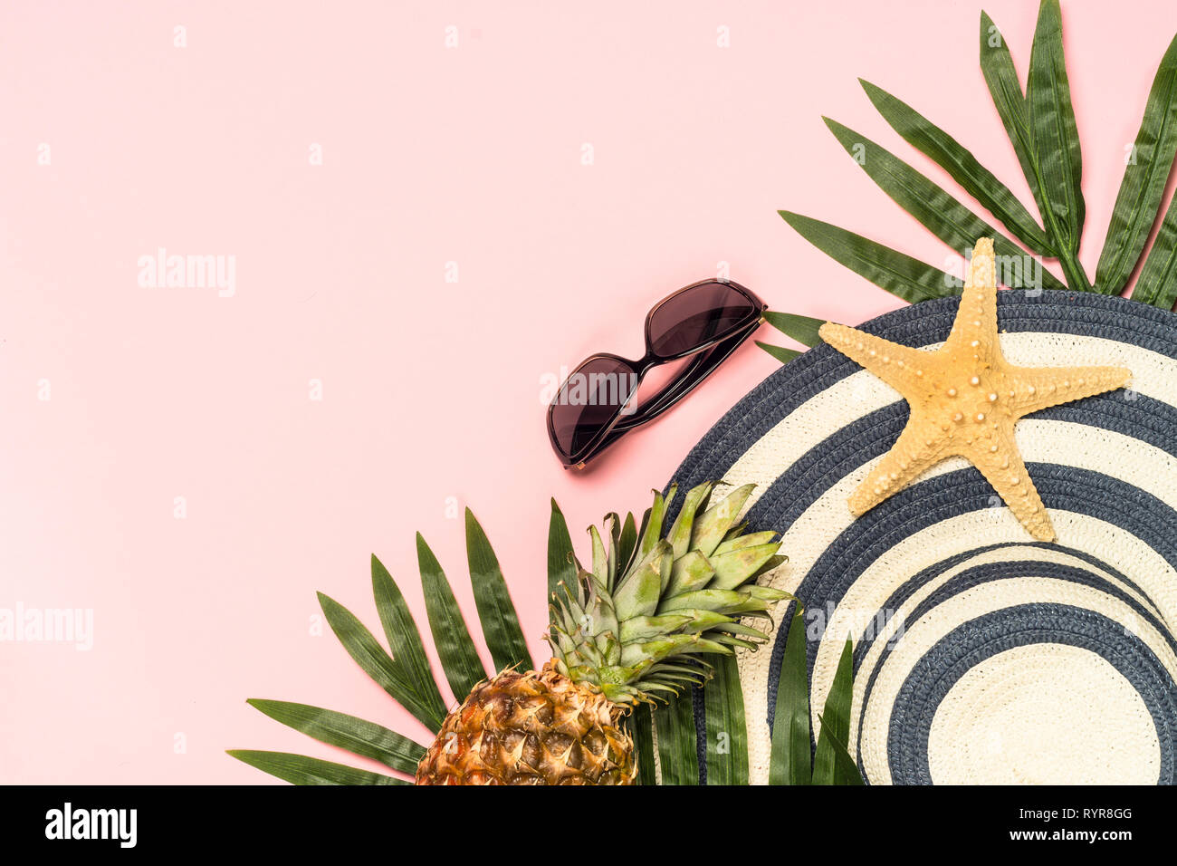 Summer flat lay background on pink Stock Photo - Alamy