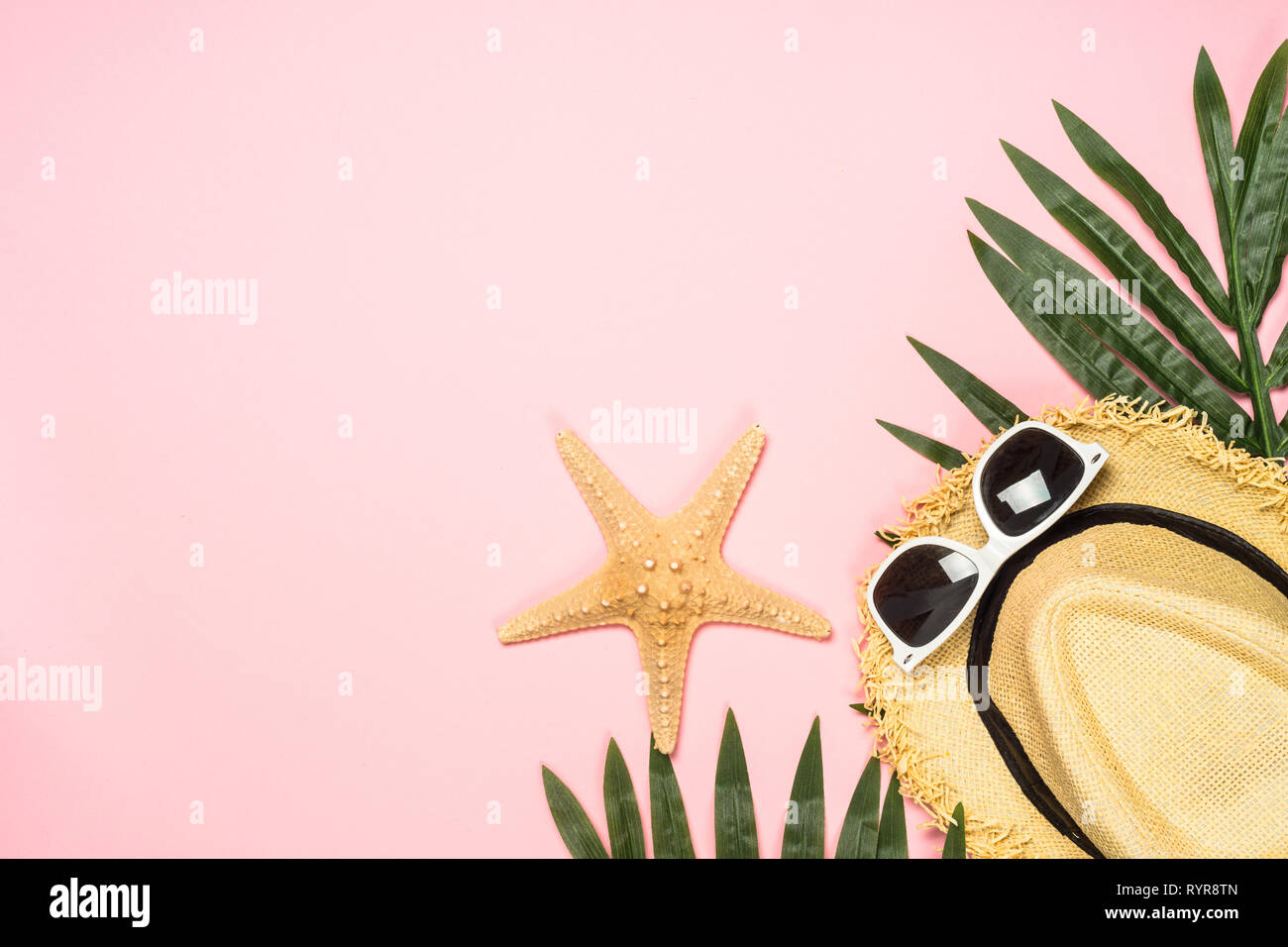 Summer flat lay background on pink Stock Photo - Alamy