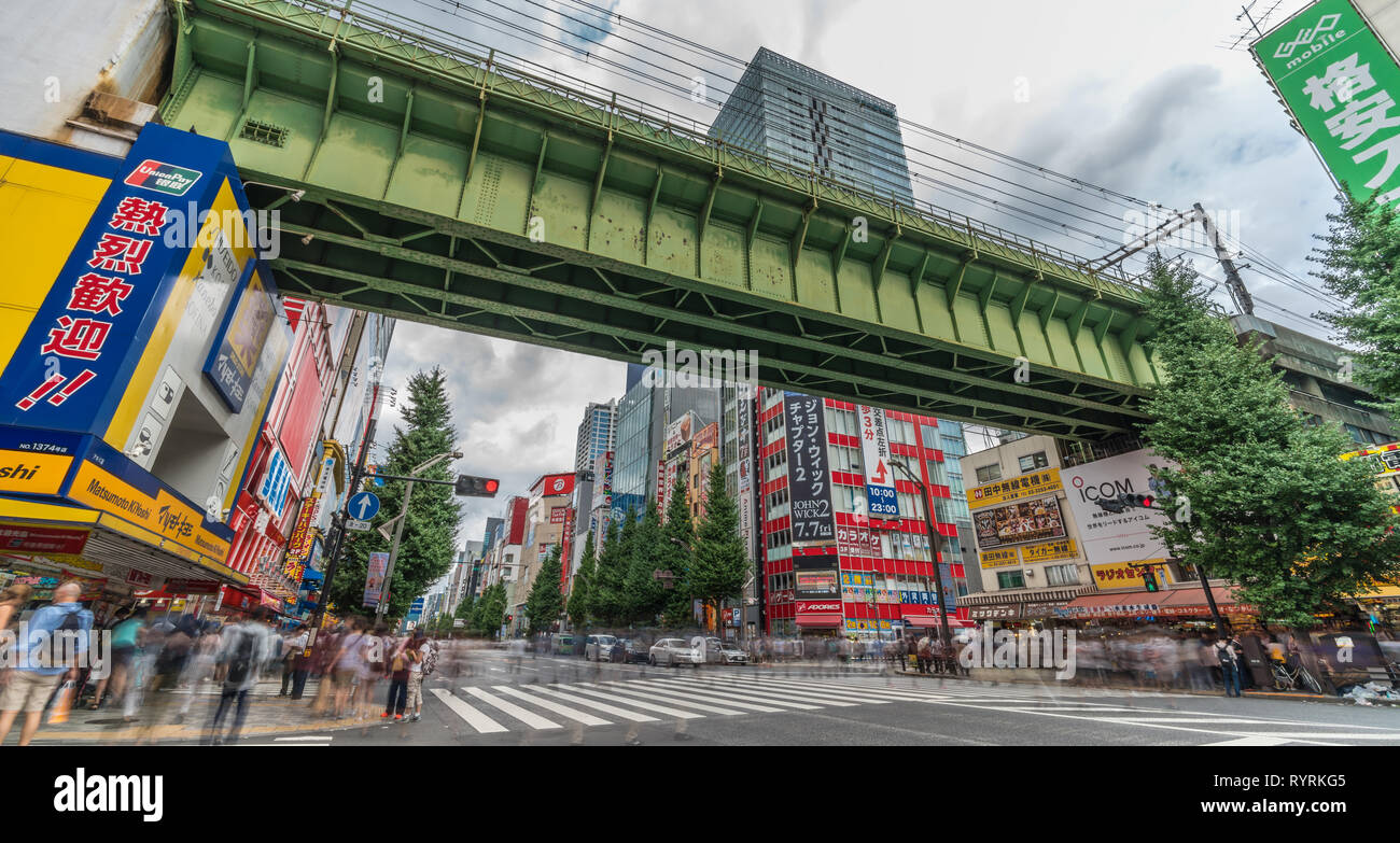 Tokyo, Taito-Ku, Akihabara - August 13, 2017 :  Colorful Bilboard Advertisements and Motion Blurred crowd in Akihabara Electric Town Stock Photo