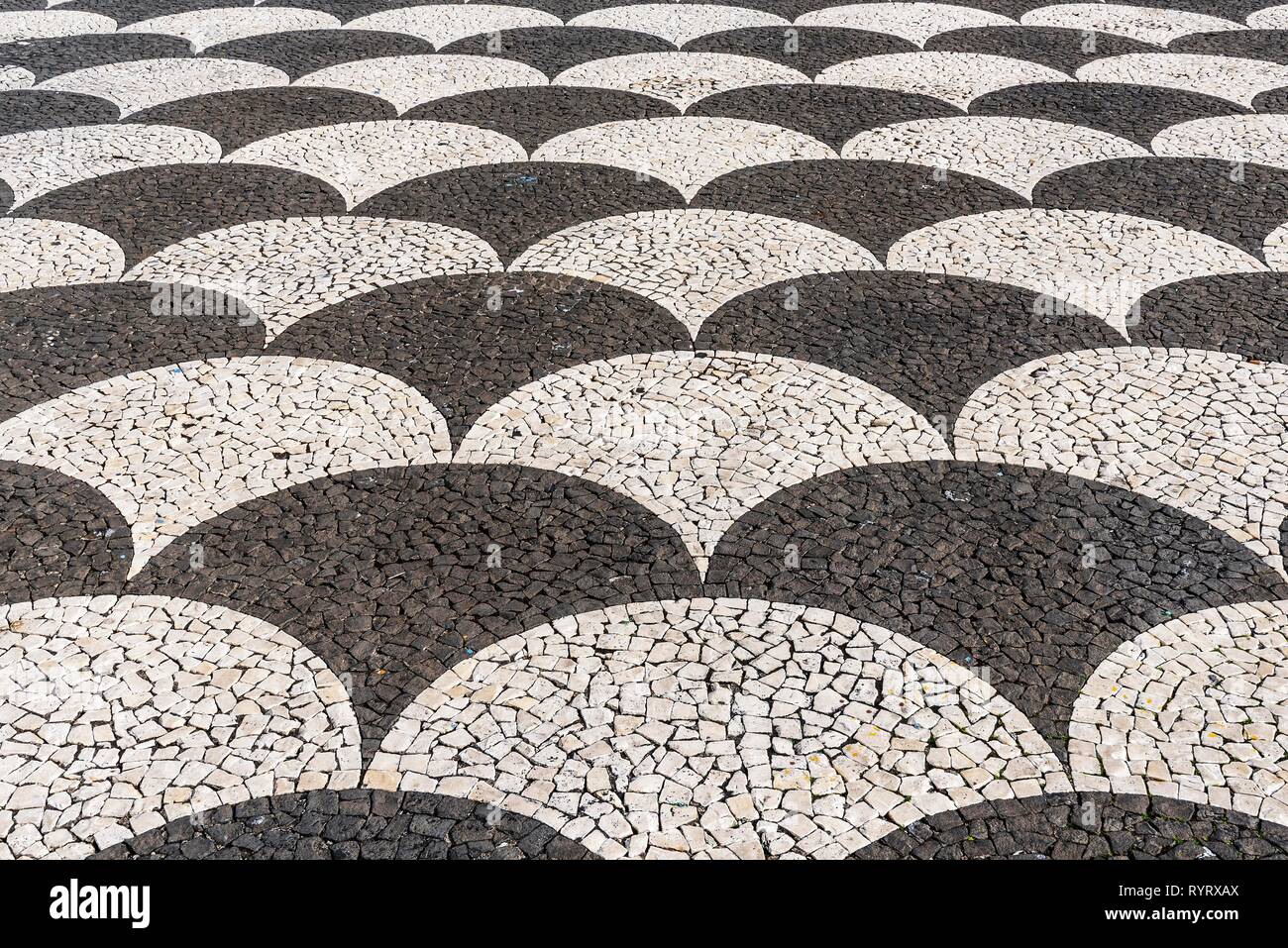 Black and white floor mosaic of cobblestones, town hall square, Funchal, Madeira, Portugal Stock Photo