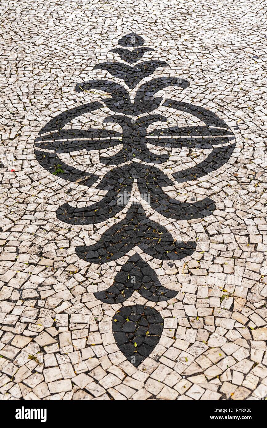 Black and white ornamental floor mosaic of paving stones, Funchal, Madeira, Portugal Stock Photo