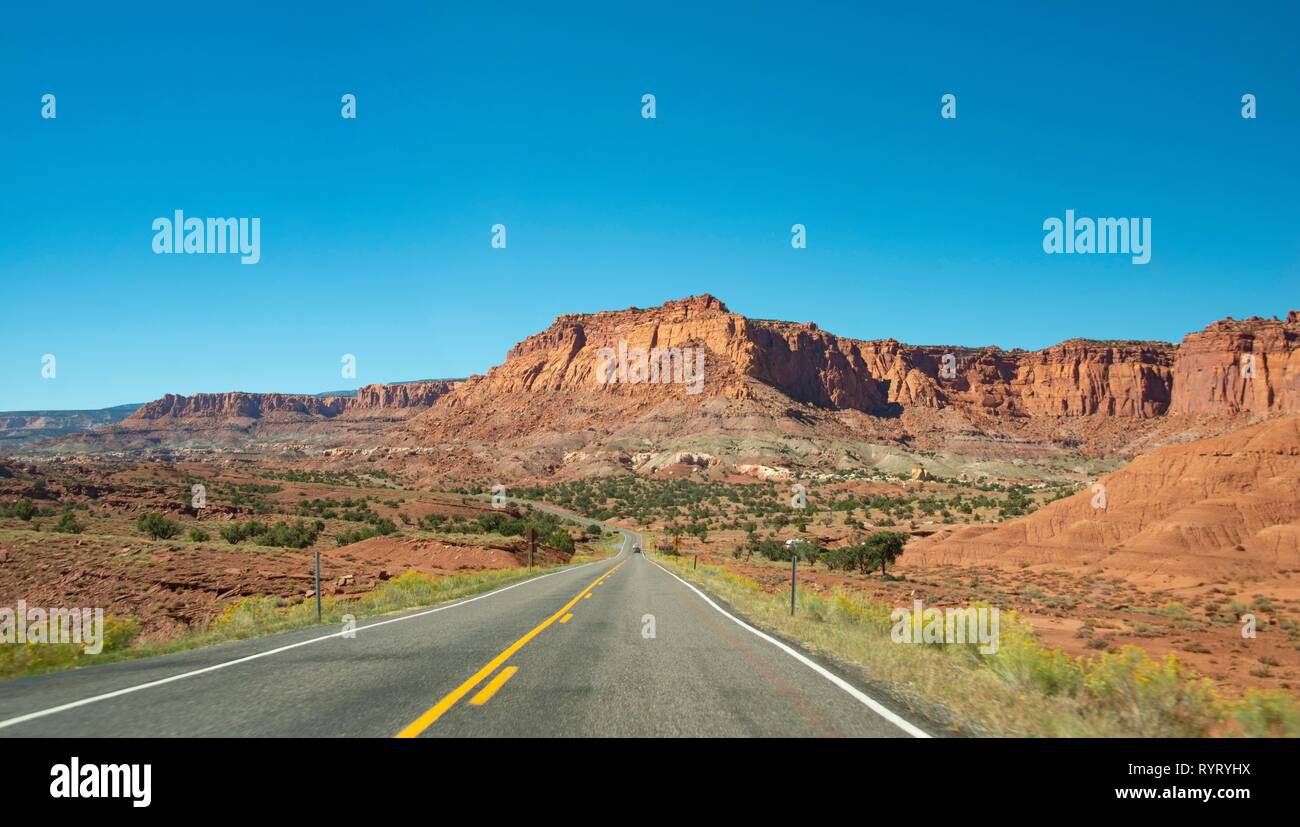 Red rugged sandstone cliffs on Highway 24, Capitol Reef National Park, Utah, Southwest, USA Stock Photo