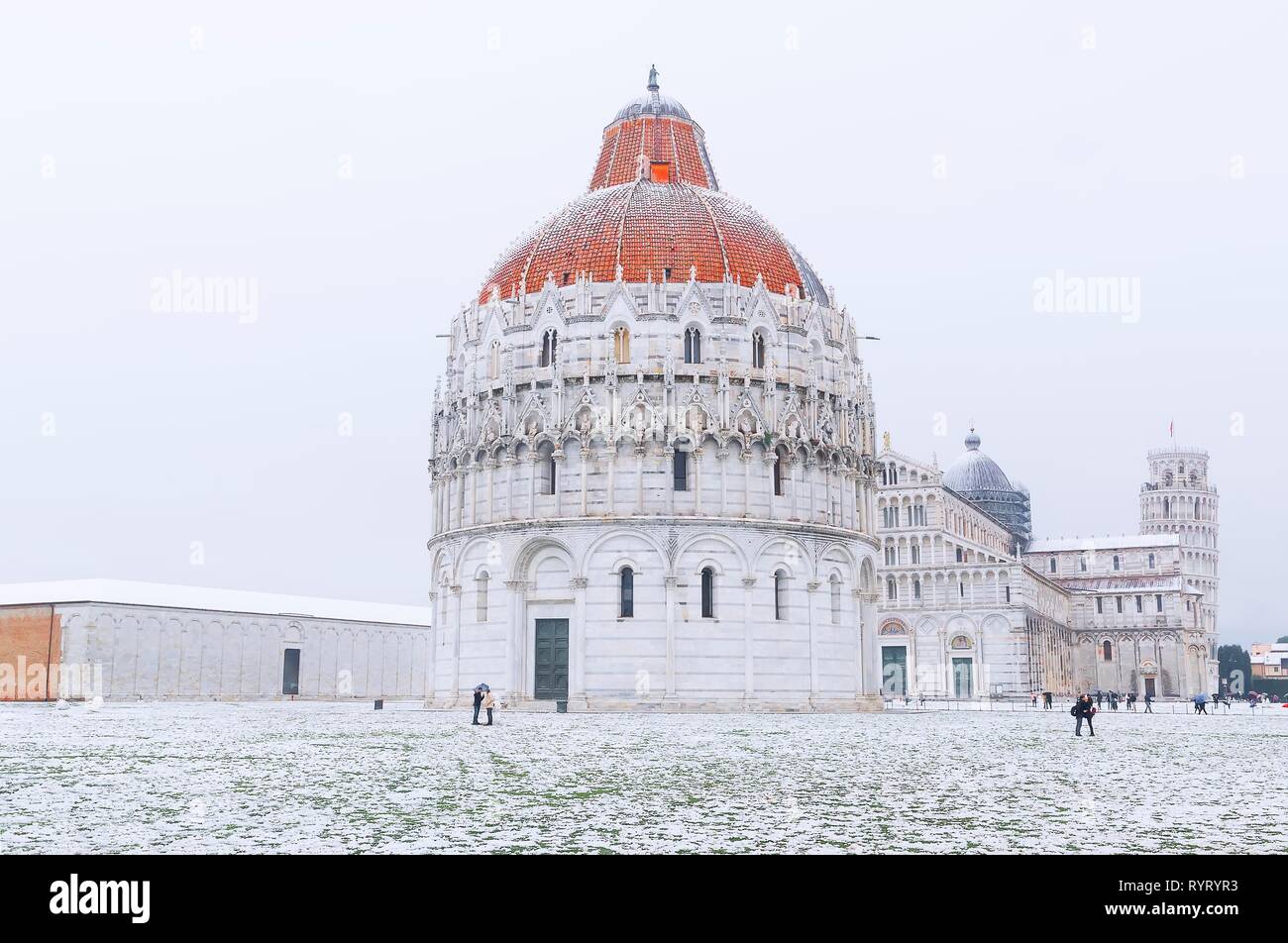 Baptistery, Cathedral and Leaning Tower with snow, Pisa, Tuscany, Italy Stock Photo