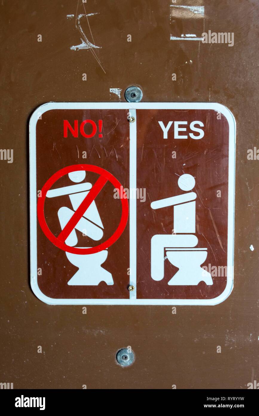 Sign on a public toilet, do not put on toilet, Grand Teton National Park, Wyoming, USA Stock Photo