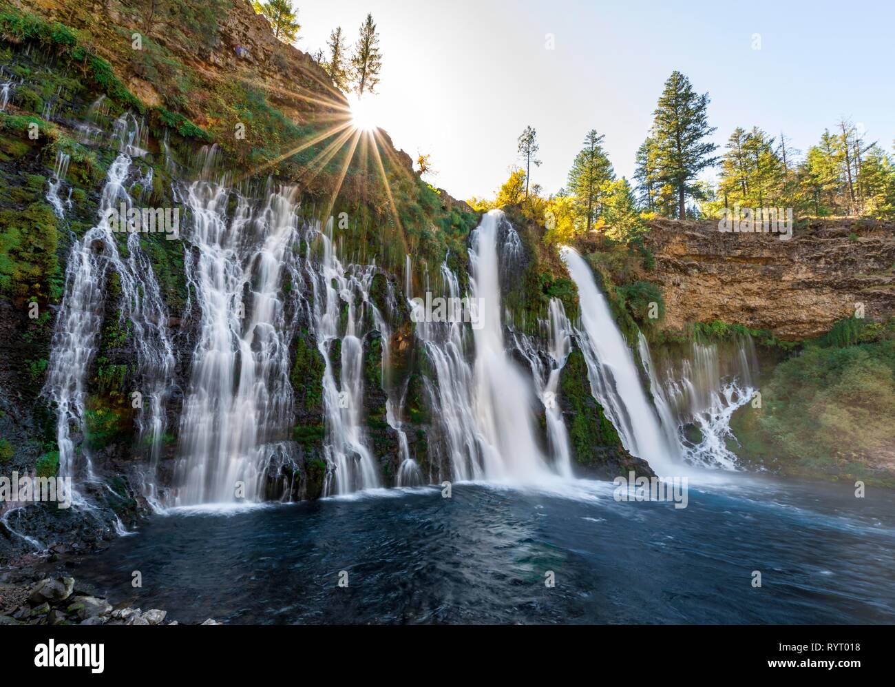 Waterfall, long-term image with solar star, McArthur-Burney Falls Memorial State Park, California, USA Stock Photo