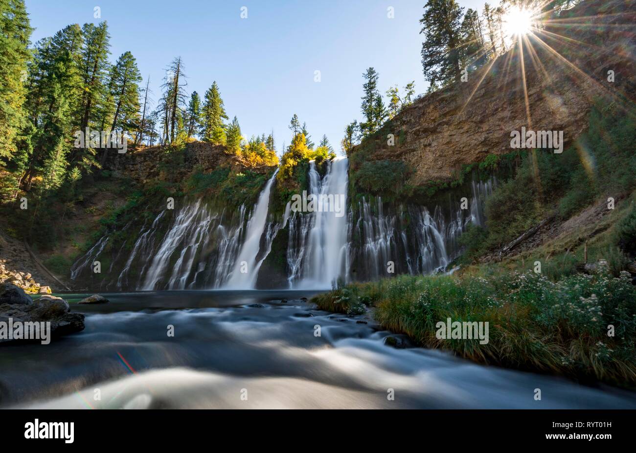 Waterfall, long-term image with solar star, McArthur-Burney Falls Memorial State Park, California, USA Stock Photo