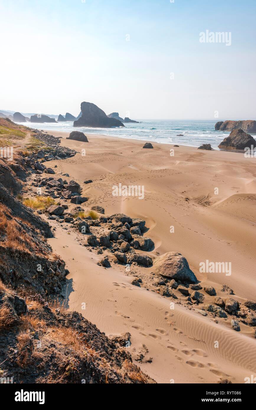 Coastal landscape, sandy beach with rugged rocks, Myers Creek Beach Viewpoint, Oregon USA Stock Photo