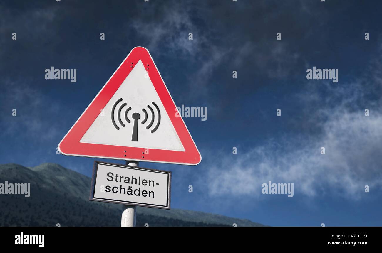 Warning sign against blue sky with clouds, warning against radiation, radiation damage, Germany Stock Photo