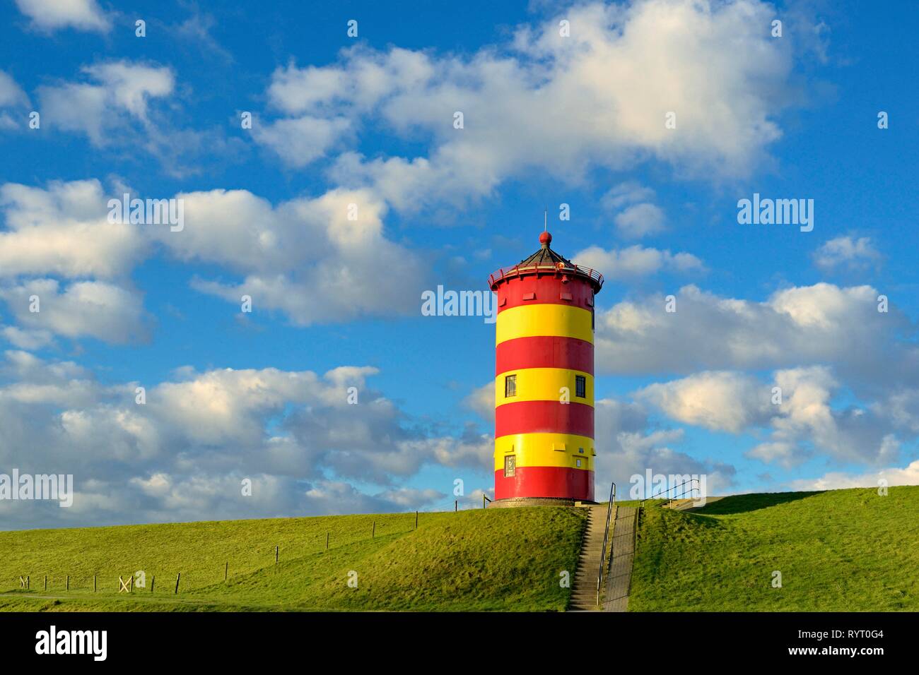 Pilsum lighthouse with blue cloudy sky, Pilsum, East Frisia, Lower Saxony, Germany Stock Photo