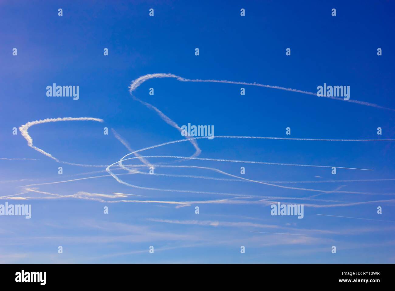 Condensation trails in the sky, Munich, Bavaria, Germany Stock Photo