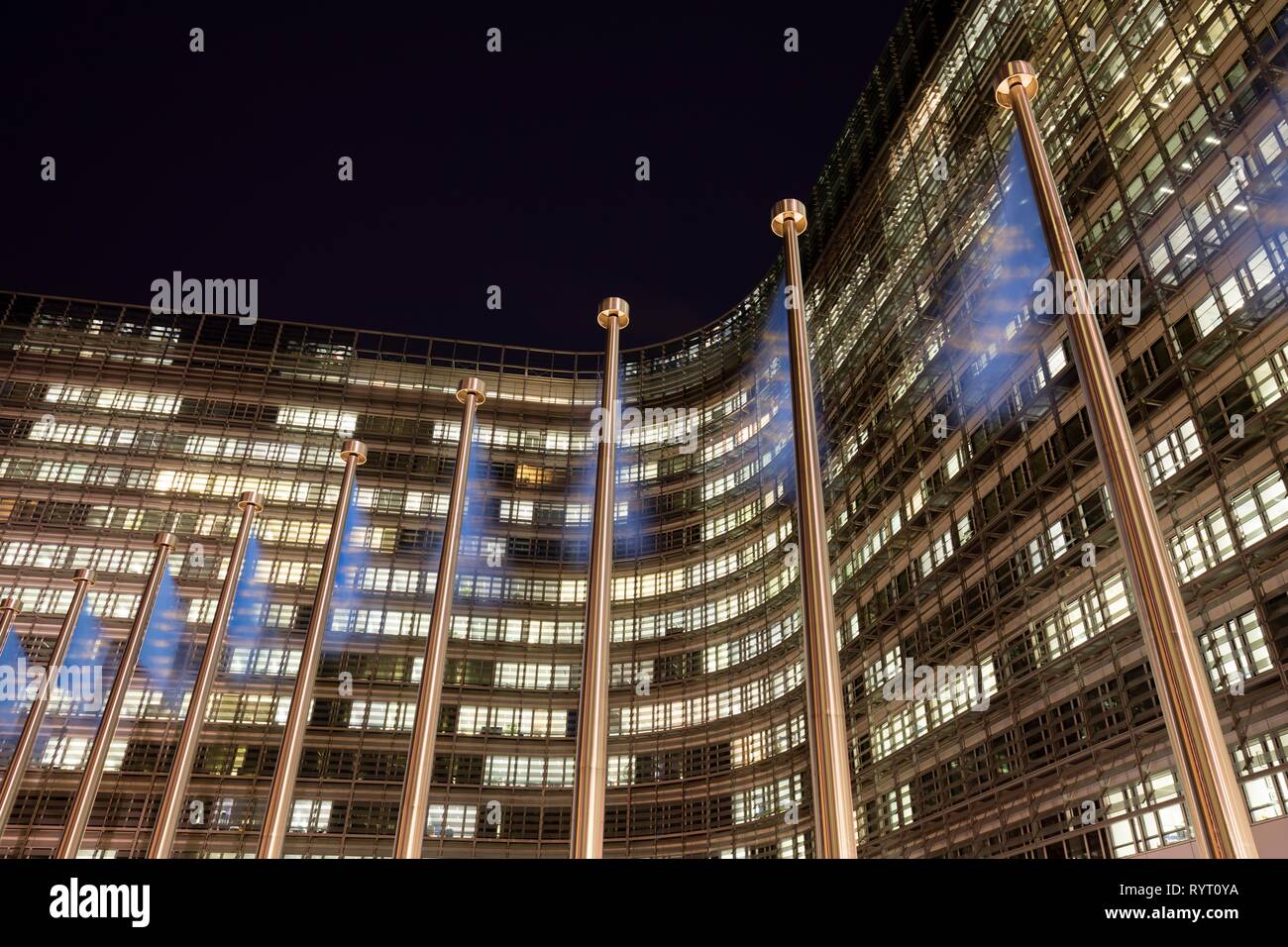 Europe flags in front of the Berlaymont building, seat of the European Commission, night shot, Europaviertel, Brussels, Belgium Stock Photo