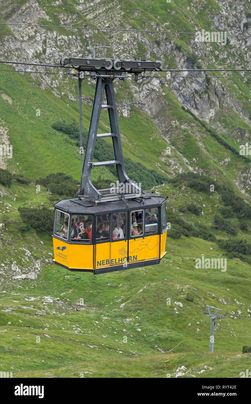 Yellow gondola of the Nebelhorn Cable Car, Nebelhorn, Oberstdorf, Allgäu, Bavaria, Germany Stock Photo