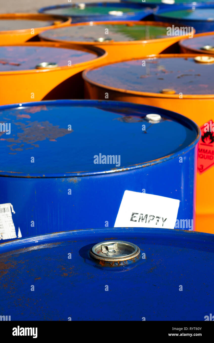 Top of 200 litre 55 US gallon empty gasoline drums in storage area
