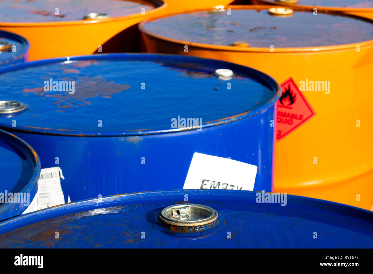 Top of 200 litre 55 US gallon empty gasoline drums in storage area