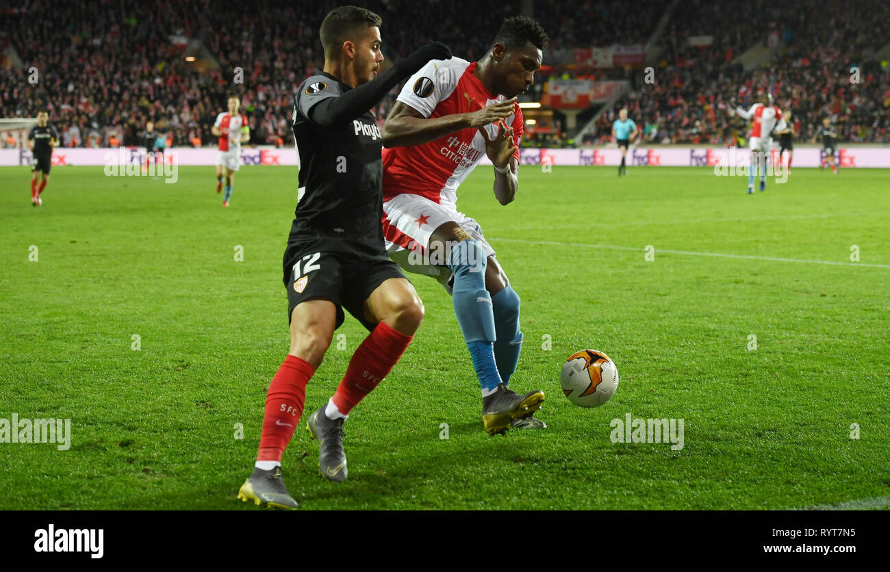 Prague, Czech Republic. 14th Apr, 2019. L-R Simon Deli (Slavia) and  Benjamin Tetteh (Sparta) are seen during the Czech first soccer league  (Fortuna Liga), 28th round, match SK Slavia Praha vs AC