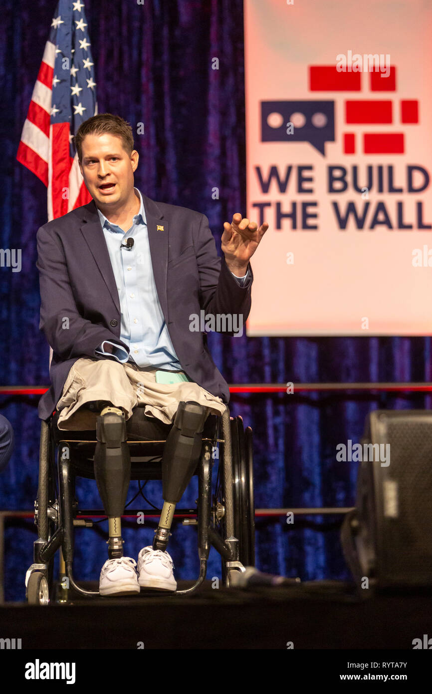 Detroit, Michigan USA - 14 March 2019 - Brian Kolfage and other immigration hard liners held a public meeting to promote construction of a wall along the Mexican border. The 'We Build the Wall' event promoted Kolfage's GoFundMe campaign to raise money for wall construction. Kolfage is a triple-amputee Air Force veteran. Credit: Jim West/Alamy Live News Stock Photo