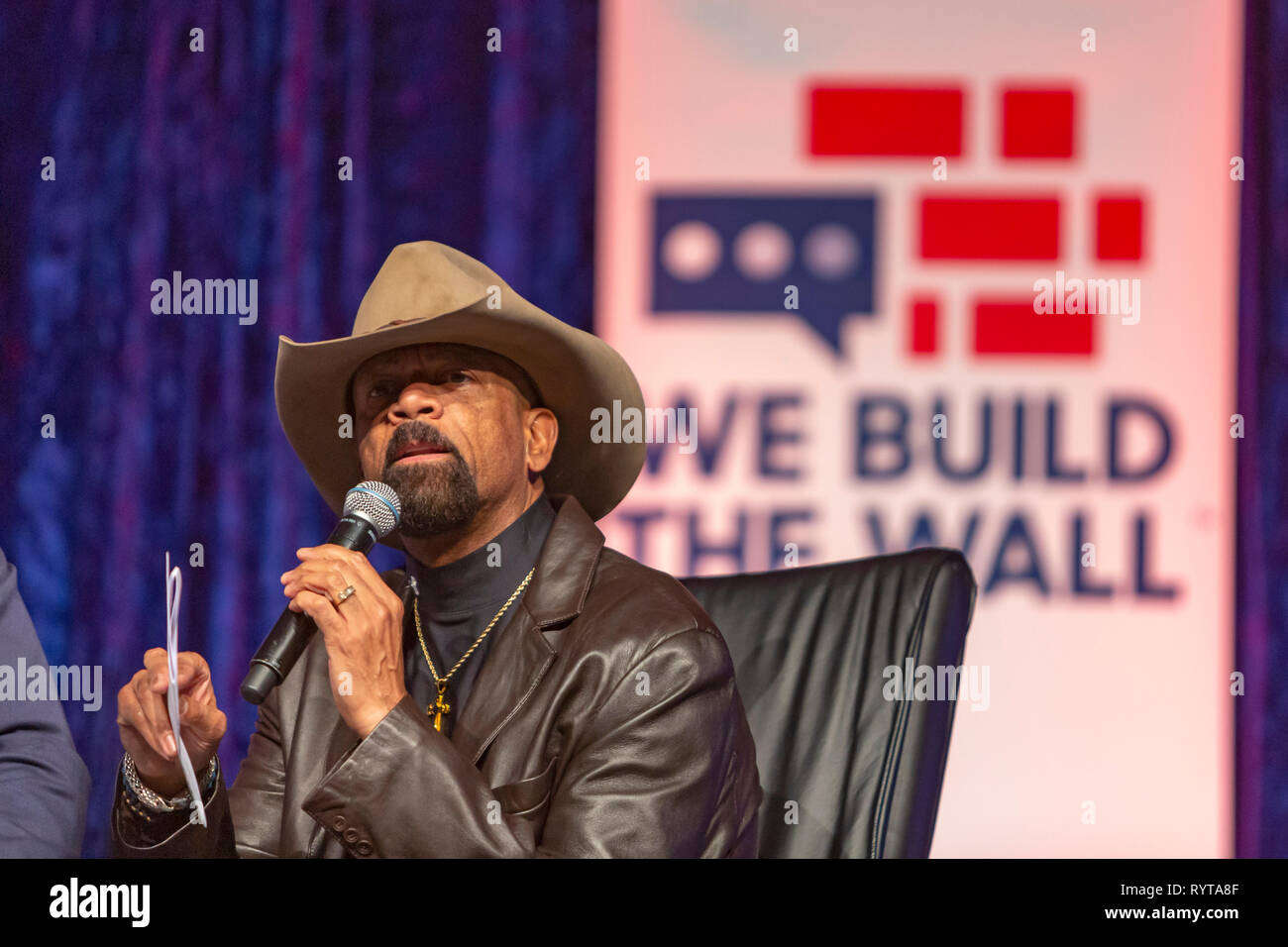 Detroit, Michigan USA - 14 March 2019 - Former Milwaukee County Sheriff David Clarke and other immigration hard liners held a public meeting to promote construction of a wall along the Mexican border. The 'We Build the Wall' event promoted an organization of the same name that is trying to raise individual contributions to fund wall construction. Credit: Jim West/Alamy Live News Stock Photo