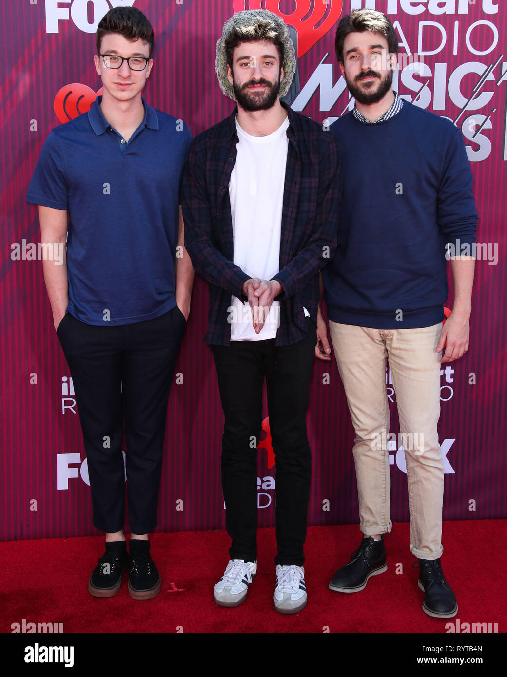 LOS ANGELES, CA, USA - MARCH 14: Ryan Joshua Met, Jack Evan Met and Adam Brett Met of AJR arrive at the 2019 iHeartRadio Music Awards held at Microsoft Theater at L.A. Live on March 14, 2019 in Los Angeles, California, United States. (Photo by Xavier Collin/Image Press Agency) Stock Photo