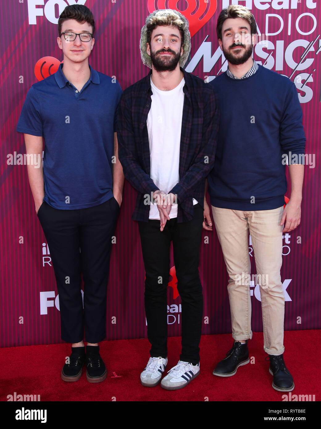 LOS ANGELES, CA, USA - MARCH 14: Ryan Joshua Met, Jack Evan Met and Adam  Brett Met of AJR arrive at the 2019 iHeartRadio Music Awards held at  Microsoft Theater at L.A.