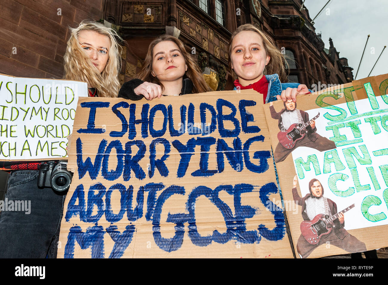 Coventry, West Midlands, UK. 15th March, 2019. A large crowd of protesters gathered outside Coventry Council House this morning with banners and placards in the latest climate change protest. Young people have taken to the streets of the UK in a global protest to try and bring about climate change.  At the protest were Lauren Gavin, Ellie Bledowski-Taylor and Steph Bledowski-Taylor, all from Coventry. Credit: Andy Gibson/Alamy Live News. Stock Photo