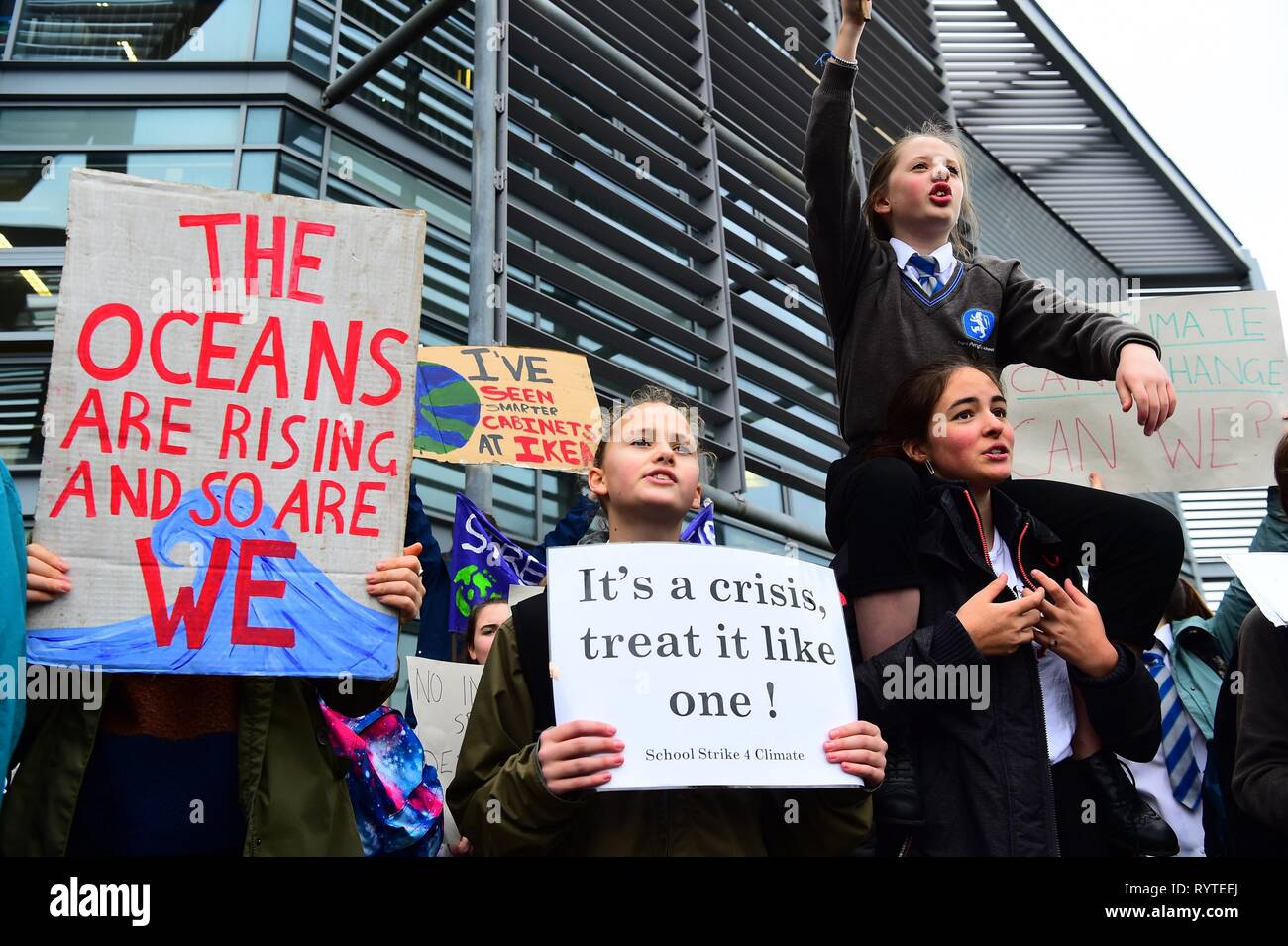 Aberystwyth Ceredigion Wales UK, Friday 15 March 2019. Pupils from local secondary schools taking part in the second UK-wide ‘school strike 4 climate', protesting outside the offices of the local council in Aberystwyth Wales photo Credit: keith morris/Alamy Live News Stock Photo