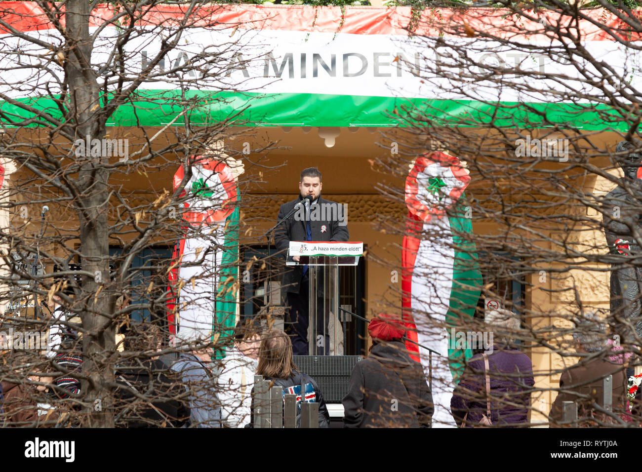 Sopron, Hungary. 15th Mar, 2019. Spokesman speaks at Petőfi Square, Sopron, Hungary. The spokesman announces the end of the event. Credit: Wahavi/Alamy Live News Stock Photo