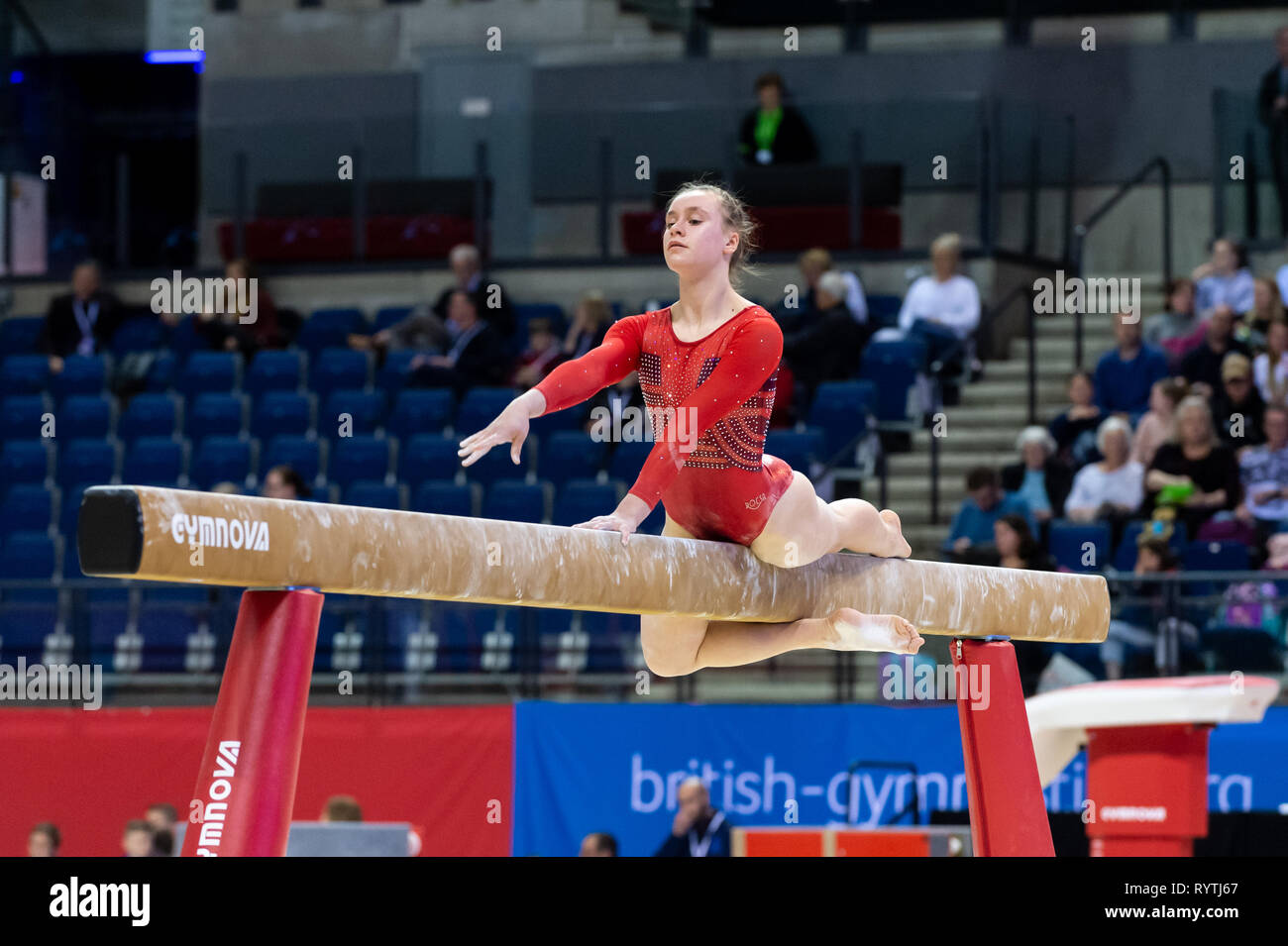 Liverpool, UK. 15th Mar, 2019. Kitty Scholes-Pryce of Park Wrekin School of Gymnastics competing during the beam rotation at the Men's and Women's Artistic British Championships 2019, M&S Bank Arena, Liverpool, UK. Credit: Iain Scott Photography/Alamy Live News Stock Photo