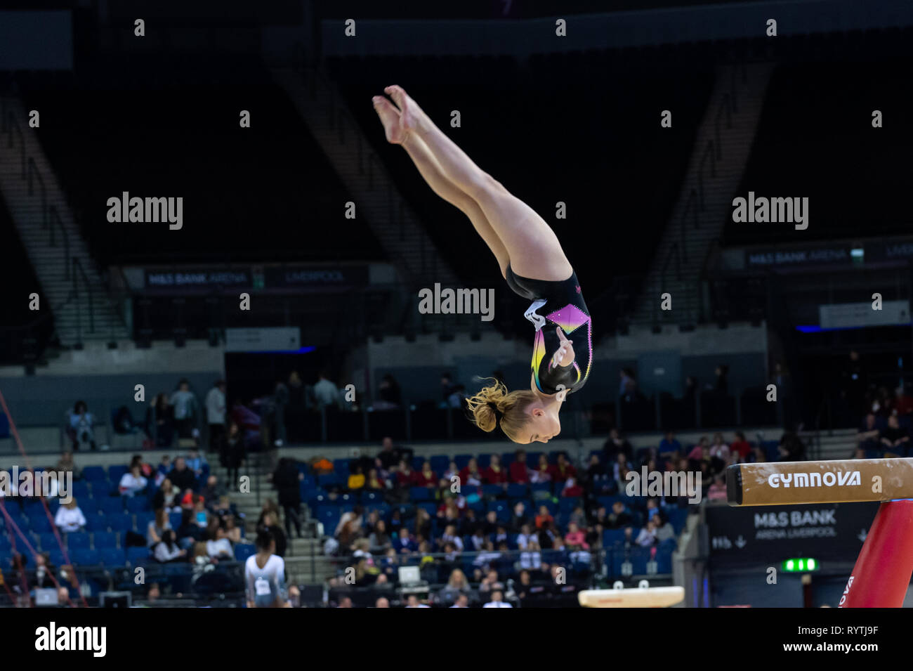 Liverpool, UK. 15th Mar, 2019. Lexie-Mae Neal of Abingdon Gymnastics Club competing during the beam rotation at the Men's and Women's Artistic British Championships 2019, M&S Bank Arena, Liverpool, UK. Credit: Iain Scott Photography/Alamy Live News Stock Photo