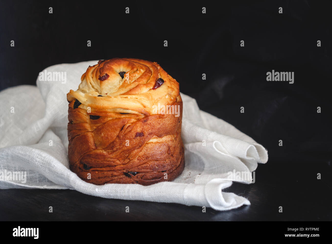 Easter cake kranch with icing sugar on a dark background. Stock Photo