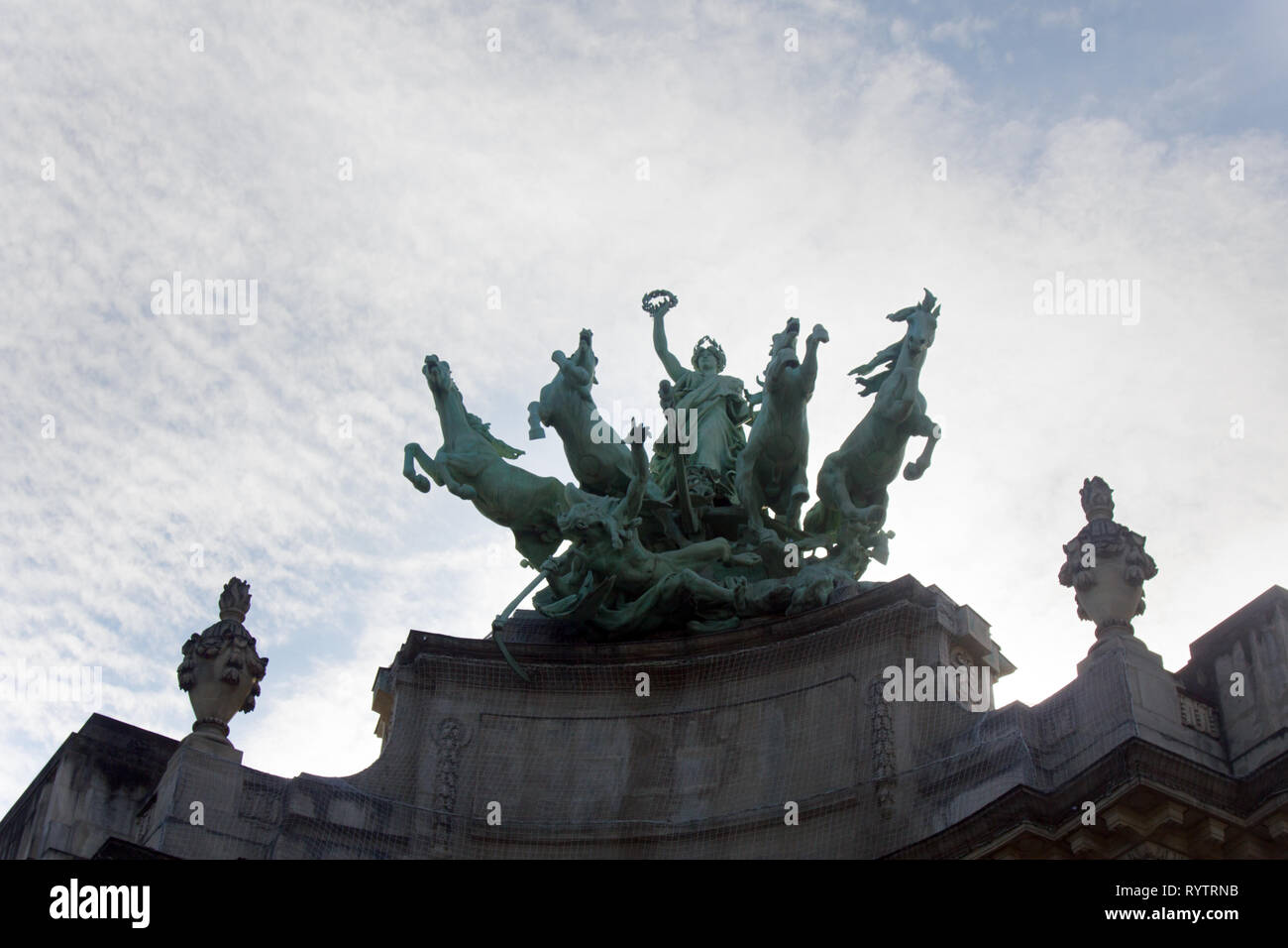 Paris, France - September 22, 2017: Sculpture of victorious four horses, winged genius, characteristic motif of Quadriga Imperial power. Immortality o Stock Photo