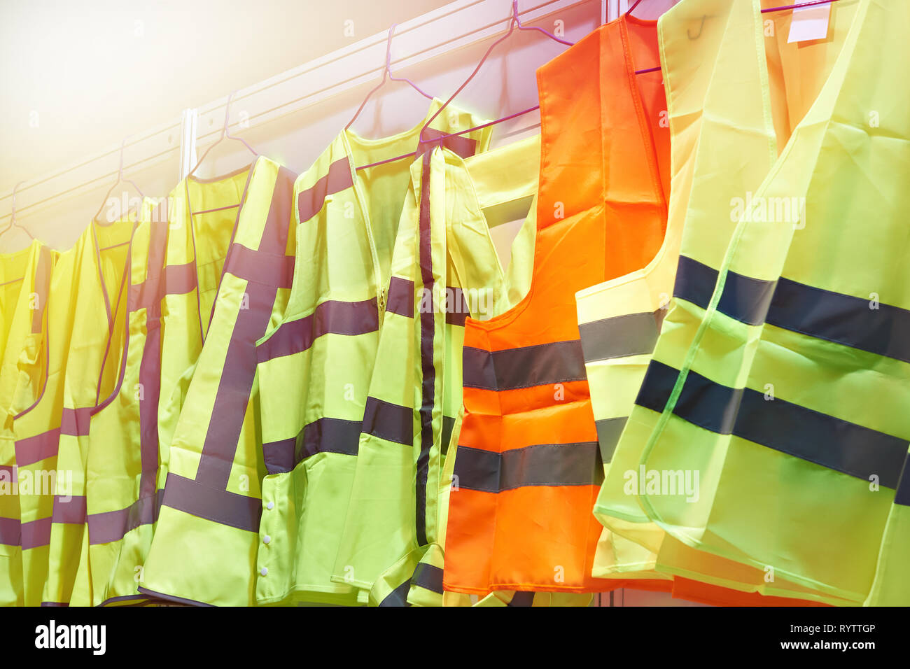 Colored, reflective vests for drivers and road workers Stock Photo