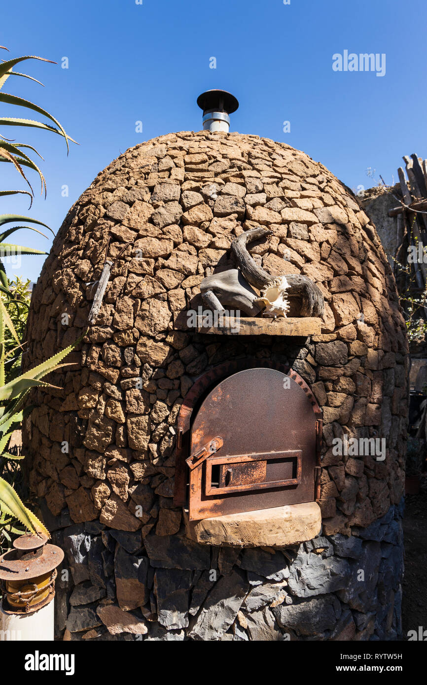 Stone built oven in a garden in Las Fuentes, Guia de Isora, Tenerife, Canary Islands, Spain Stock Photo