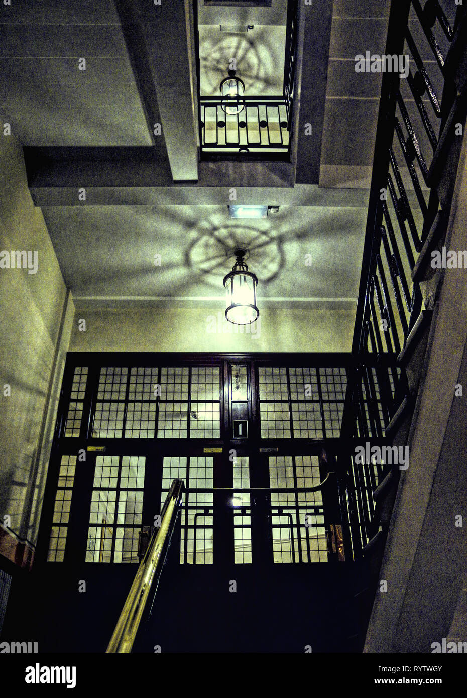 Dark staircase in an apartment building Stock Photo - Alamy