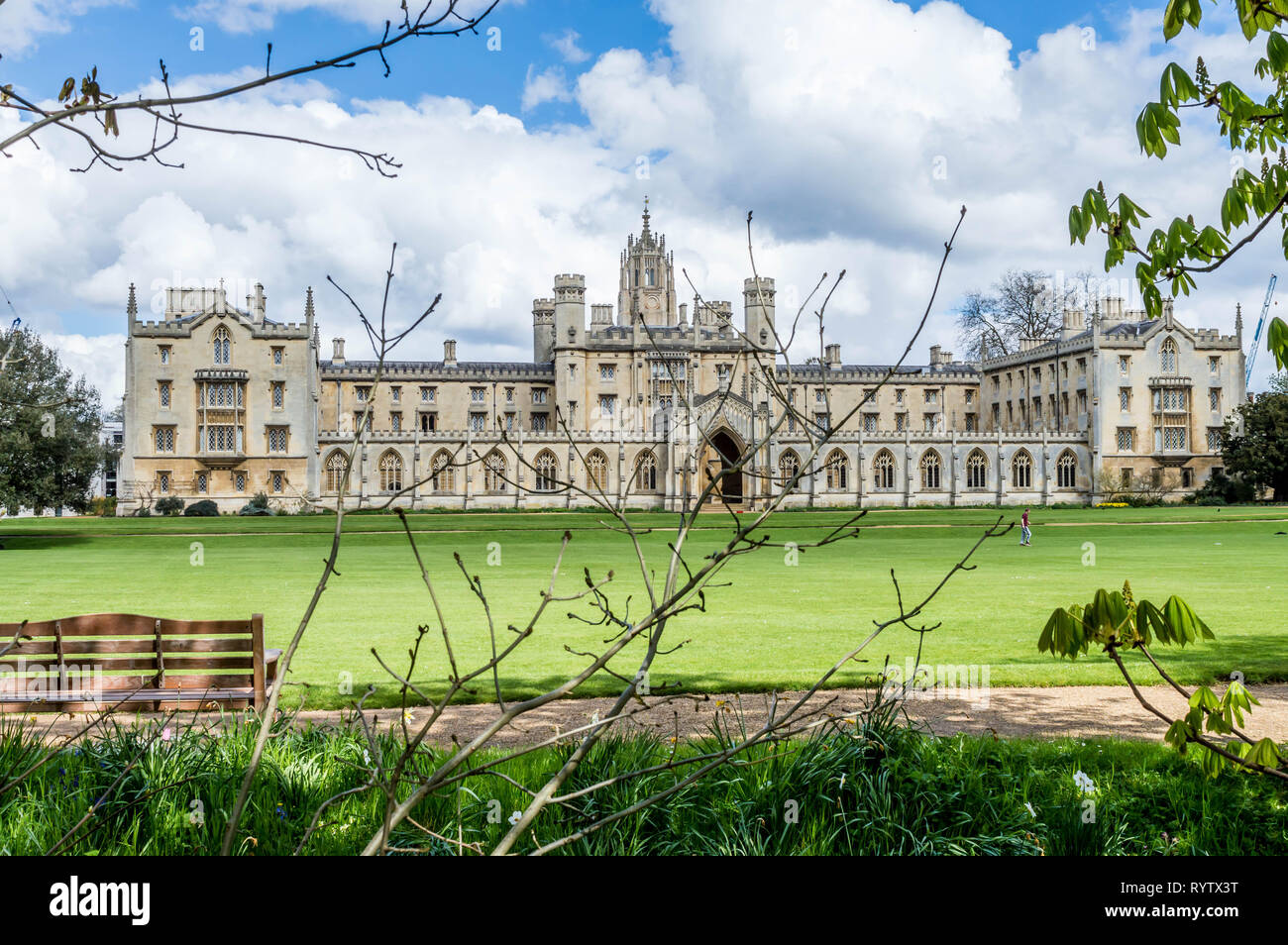 Saint John College on a bright sunny day with patches of clouds over the blue sky, Cambridge, Cambridgeshire, United Kingdom Stock Photo