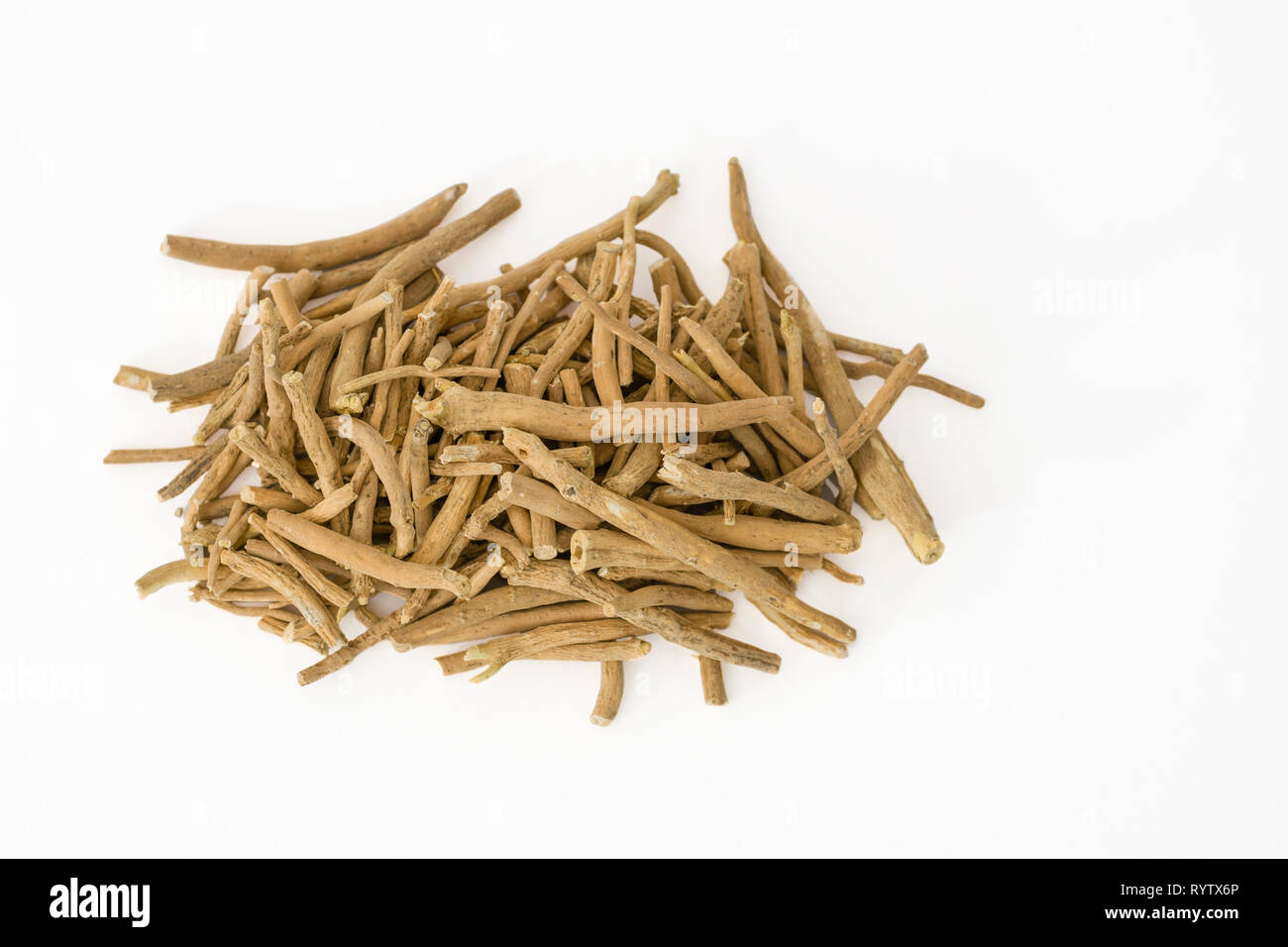 Ashwagandha (Withania somnifera) or winter cherry roots on a white background Stock Photo