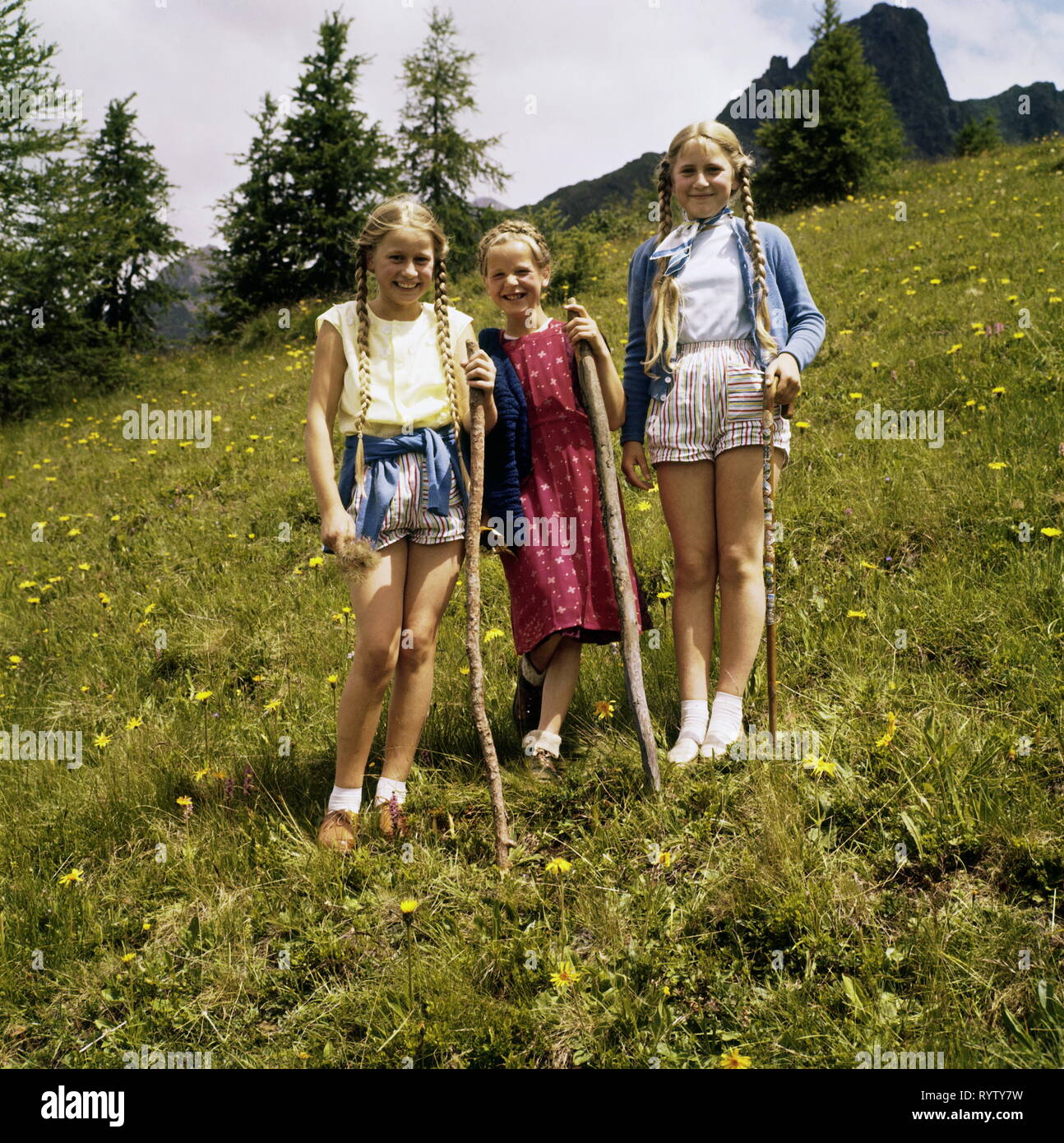 people people children 1950s three girls hiking with sticks mountain farmer family Additional Rights Clearance Info Not Available Stock Photo Alamy