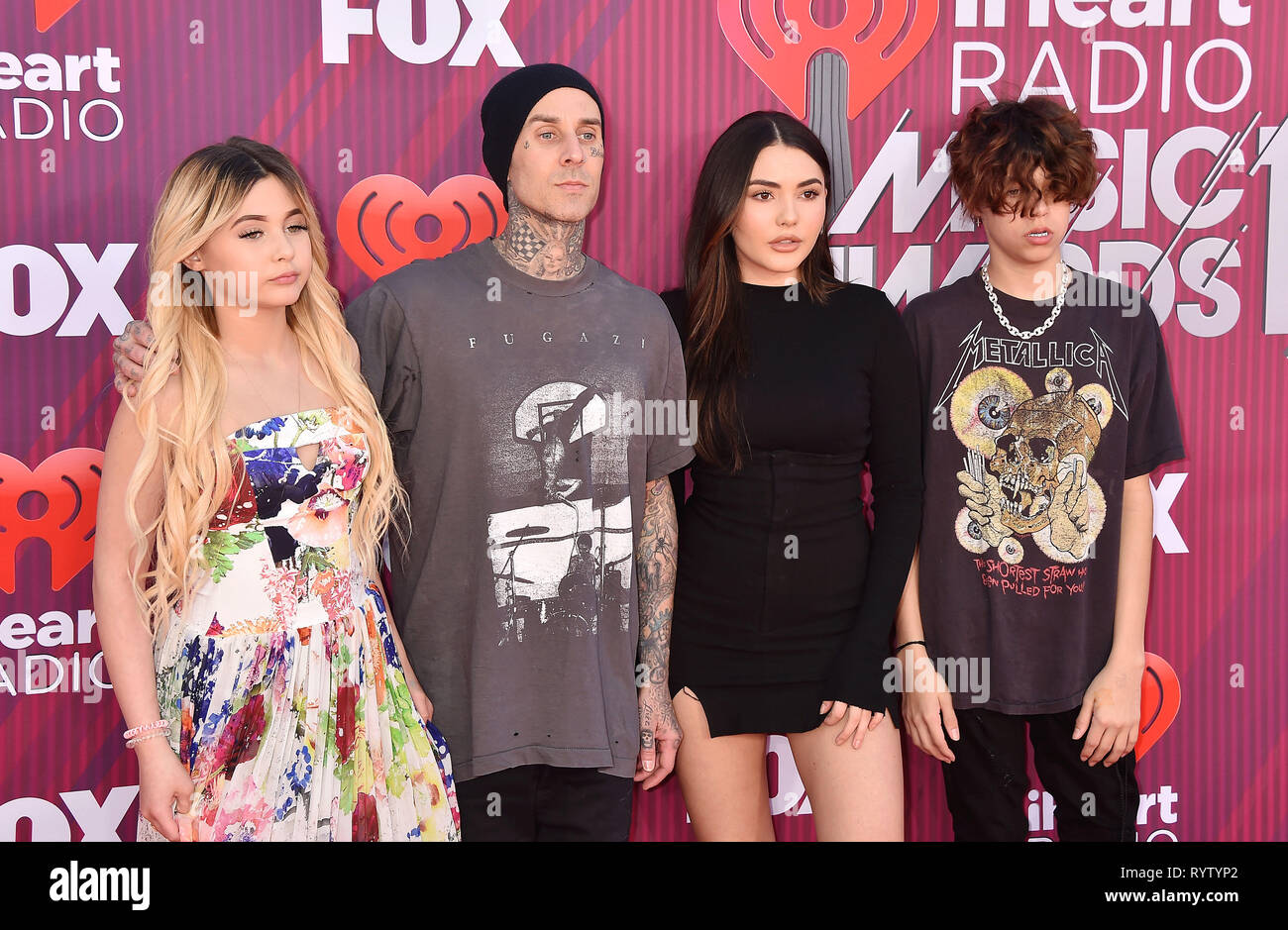 LOS ANGELES, CA - MARCH 14: (L-R) Alabama Barker, Travis Barker, Atiana