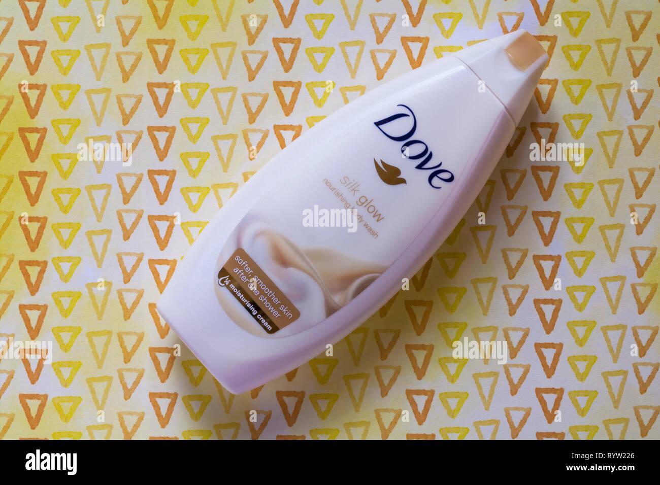 bottle of Dove silk glow moisturising body wash on patterned background  Stock Photo - Alamy