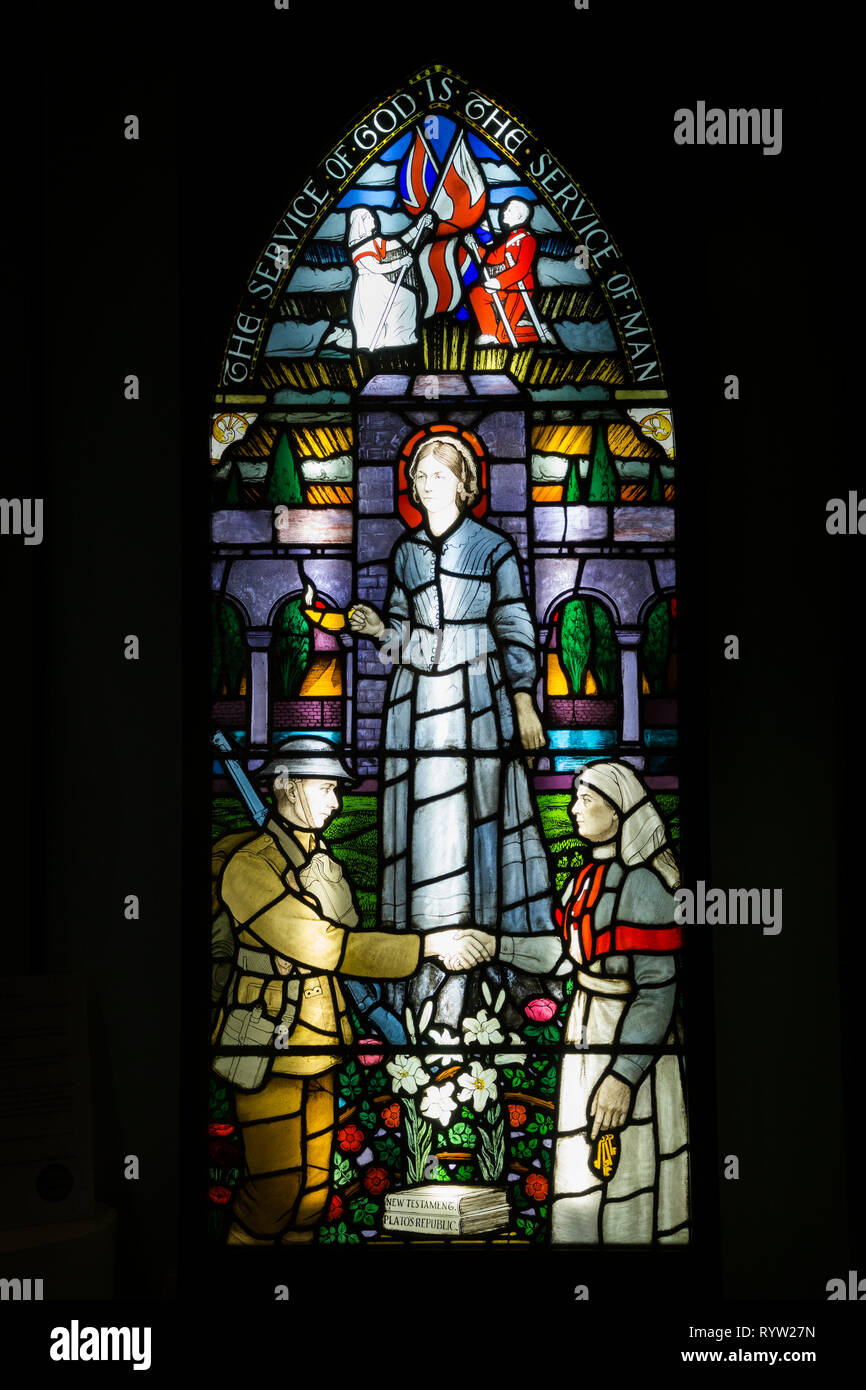 Painted & leaded glass 'Lancet' window panel on display at the Florence