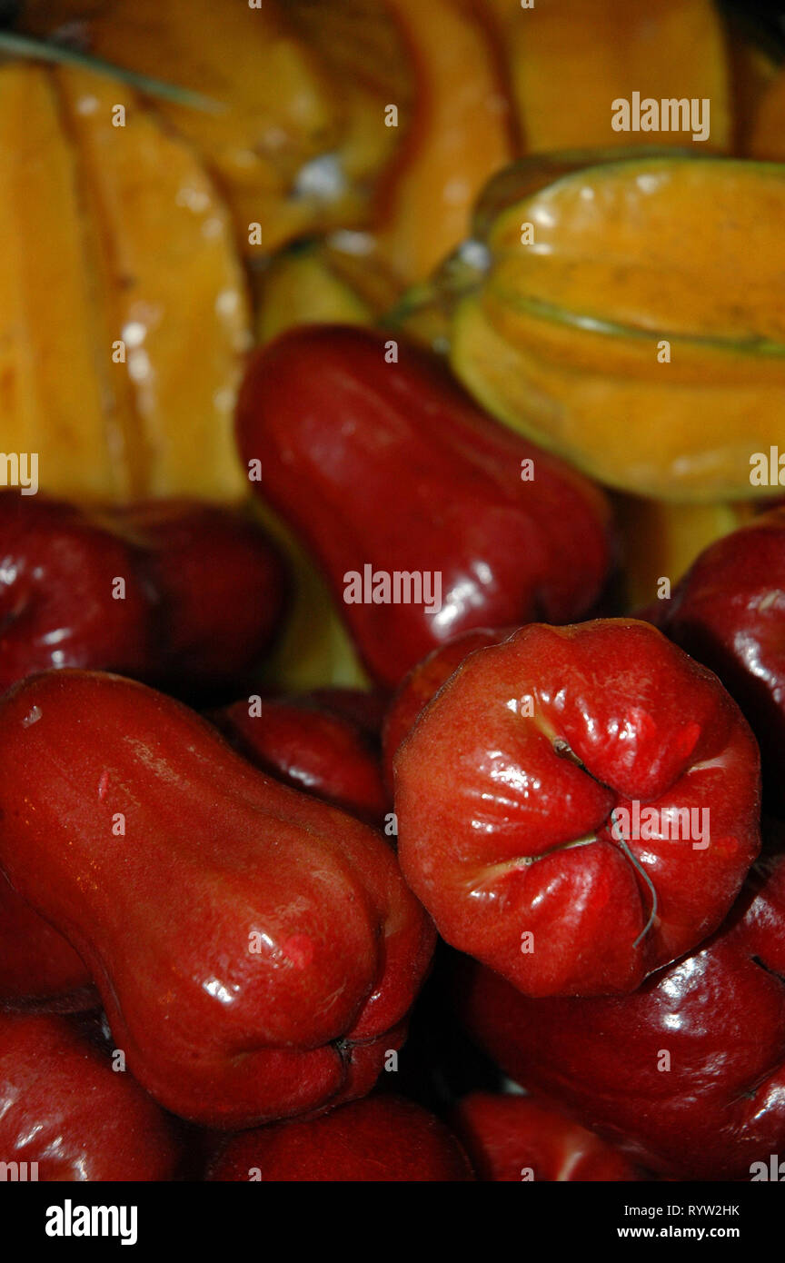 Photo tropical fruit,Dzhamboza, pomaroz, or rose apple ,. Syzygium jambos, fruit tree, Myrta family Stock Photo