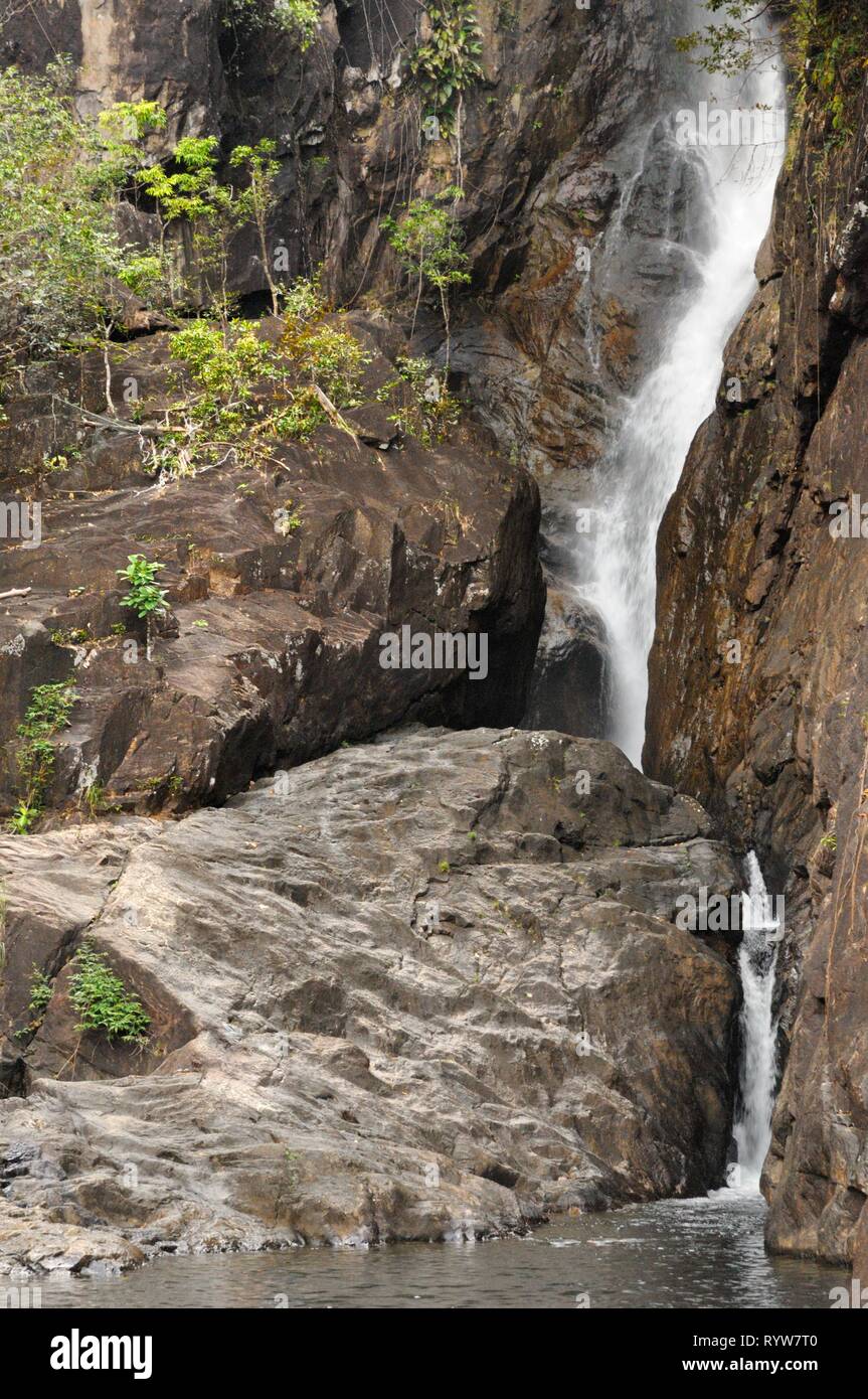 Tropical waterfall in rainforest. Khlong Phlu Waterfall on Koh Chang island, Thailand. Stock Photo