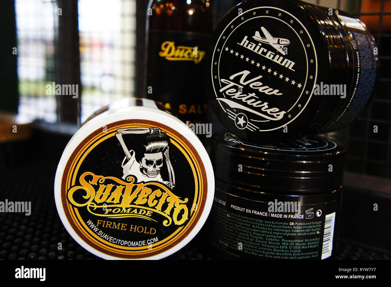 pomade strong firme hold. trendy barbershop styling. gel for male styling - SuaVecito, hairgum, ducky. Stock Photo